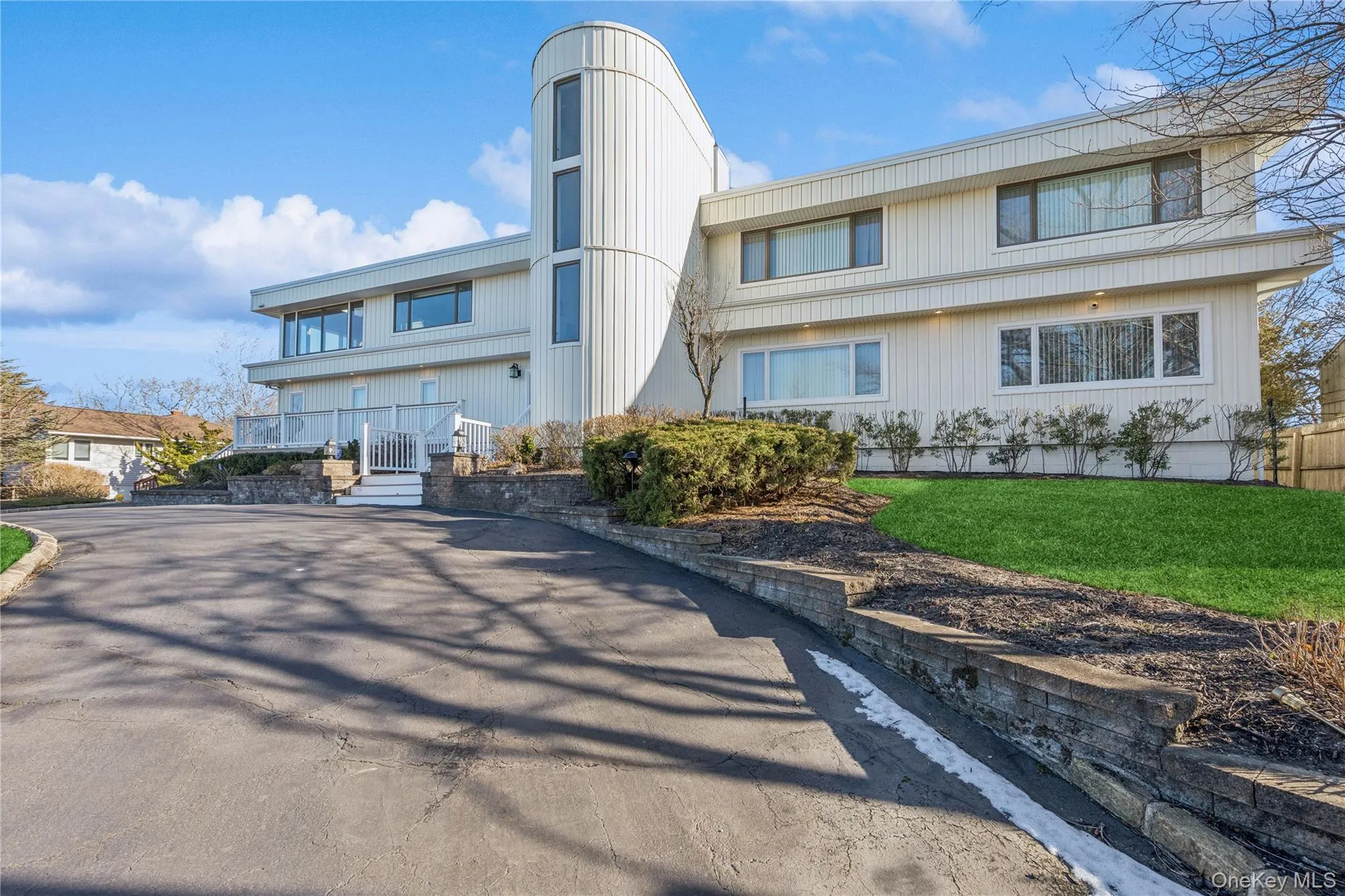 View of front facade featuring a front yard View of front facade featuring a front yard