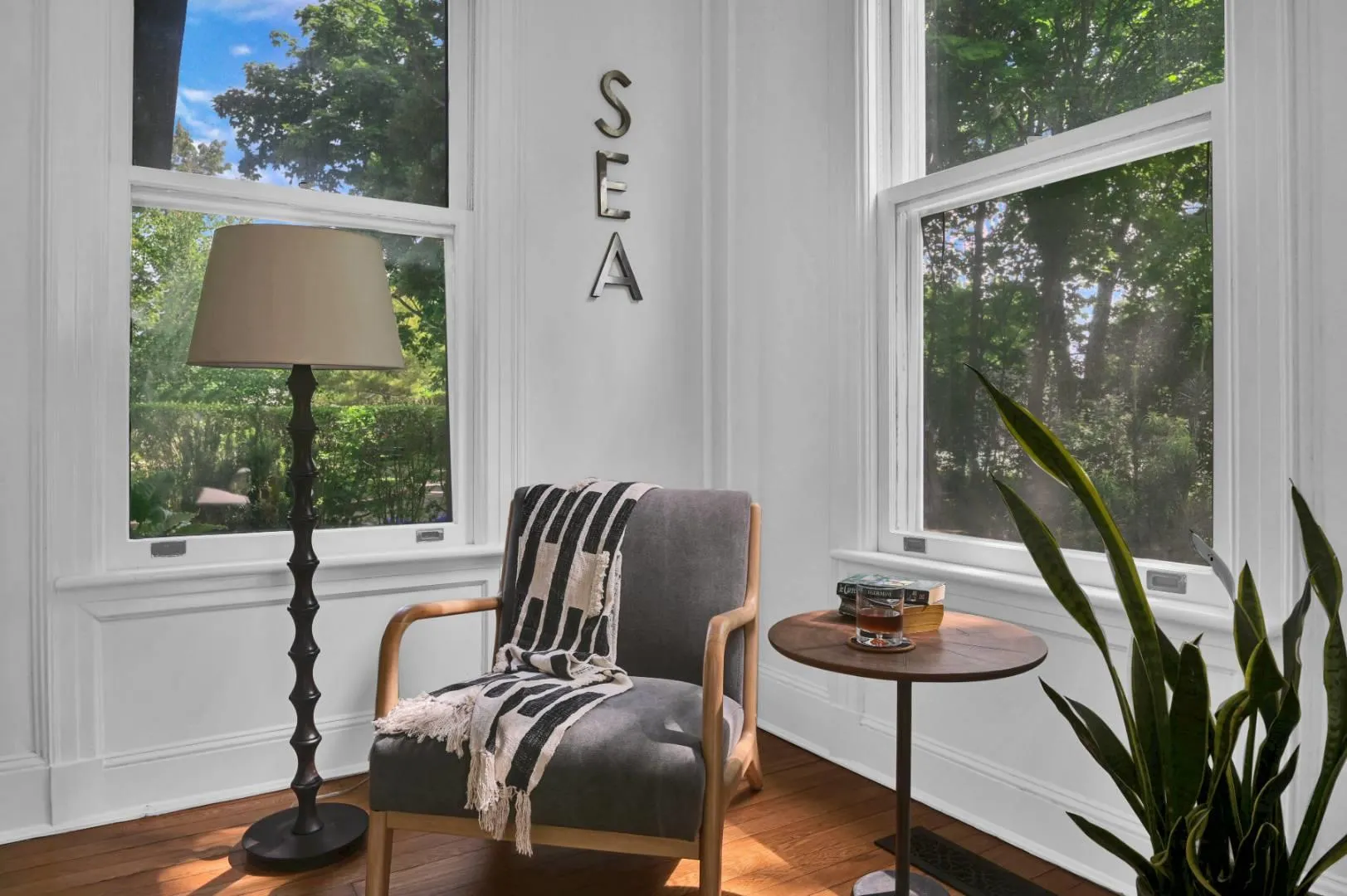 Sitting room featuring hardwood / wood-style flooring Sitting room featuring hardwood / wood-style flooring