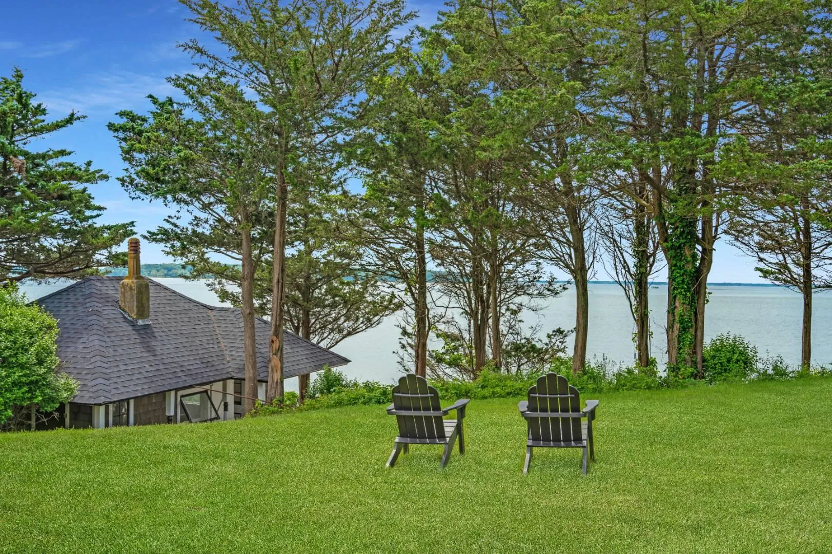 View of yard featuring a water view View of yard featuring a water view