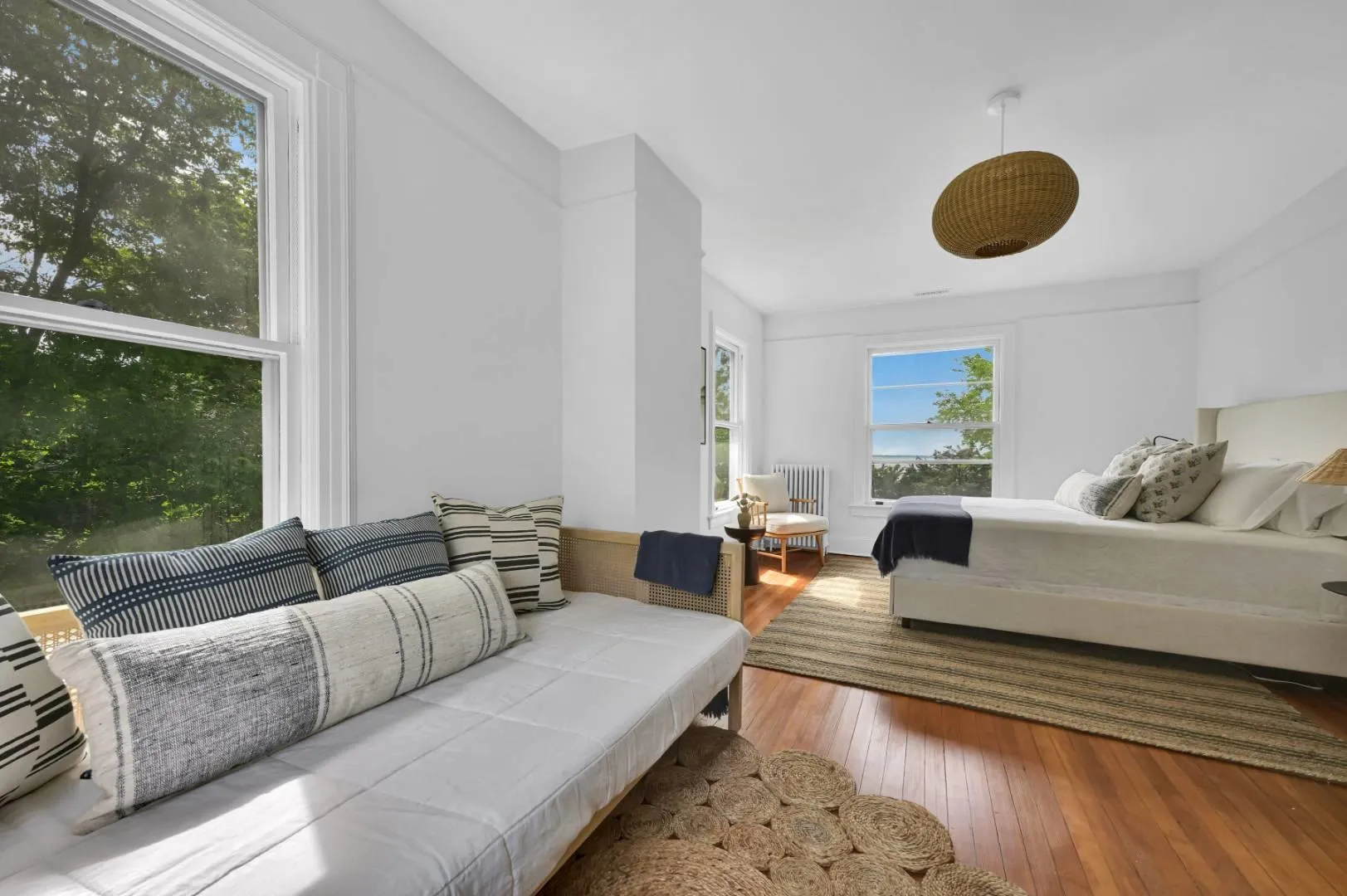 Bedroom with light hardwood / wood-style flooring Bedroom with light hardwood / wood-style flooring