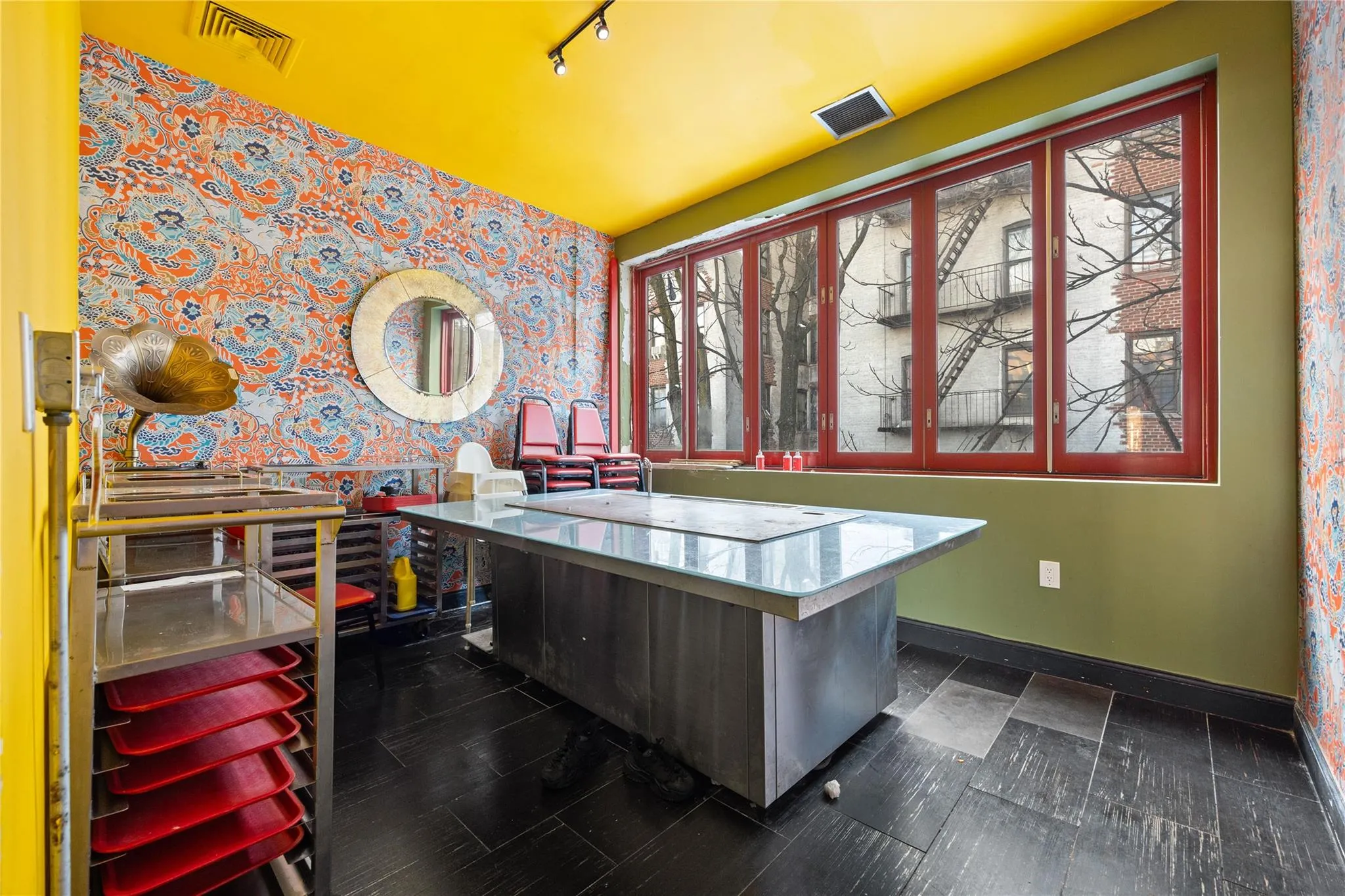 Kitchen with track lighting and a kitchen breakfast bar Kitchen with track lighting and a kitchen breakfast bar