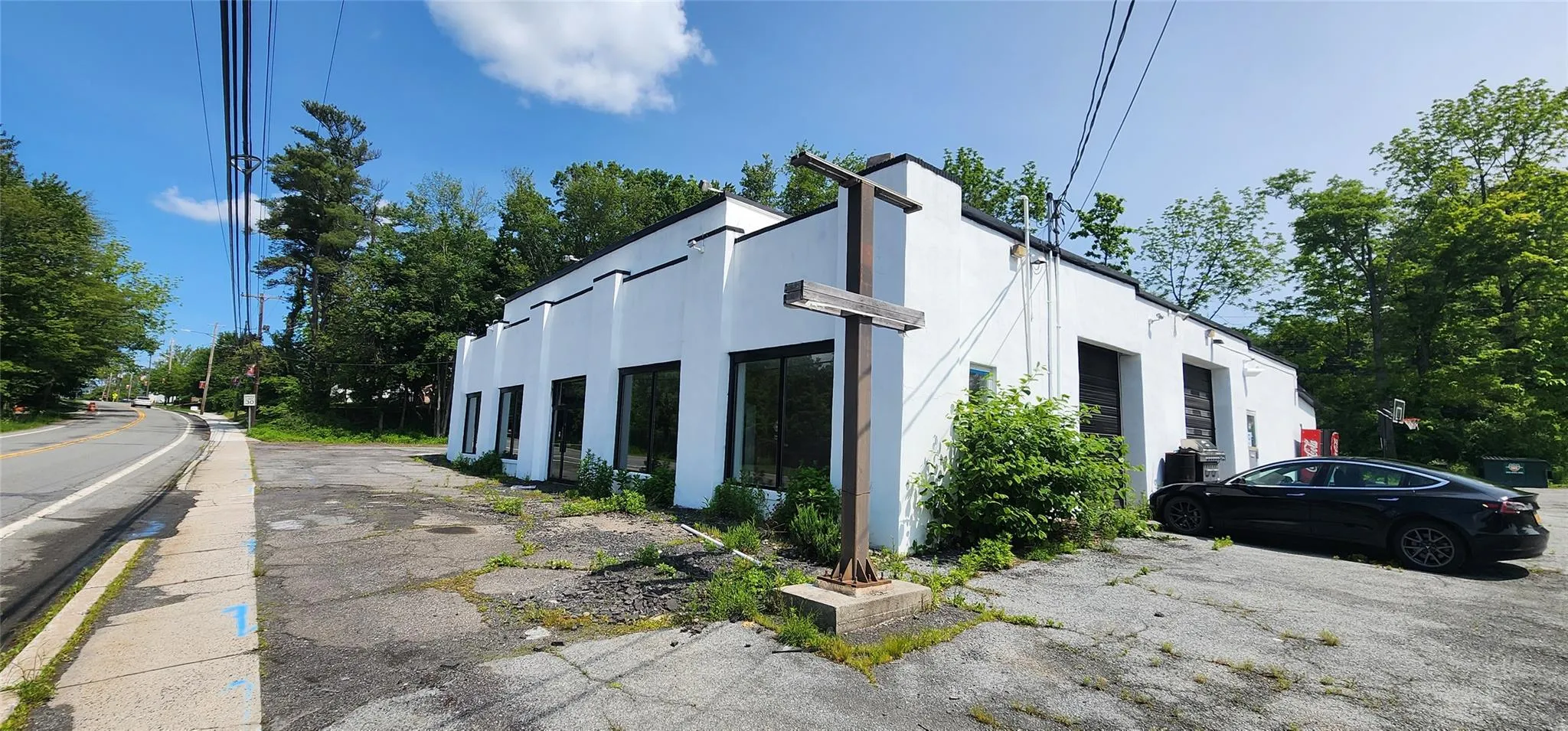 View of side of home featuring stucco siding View of side of home featuring stucco siding