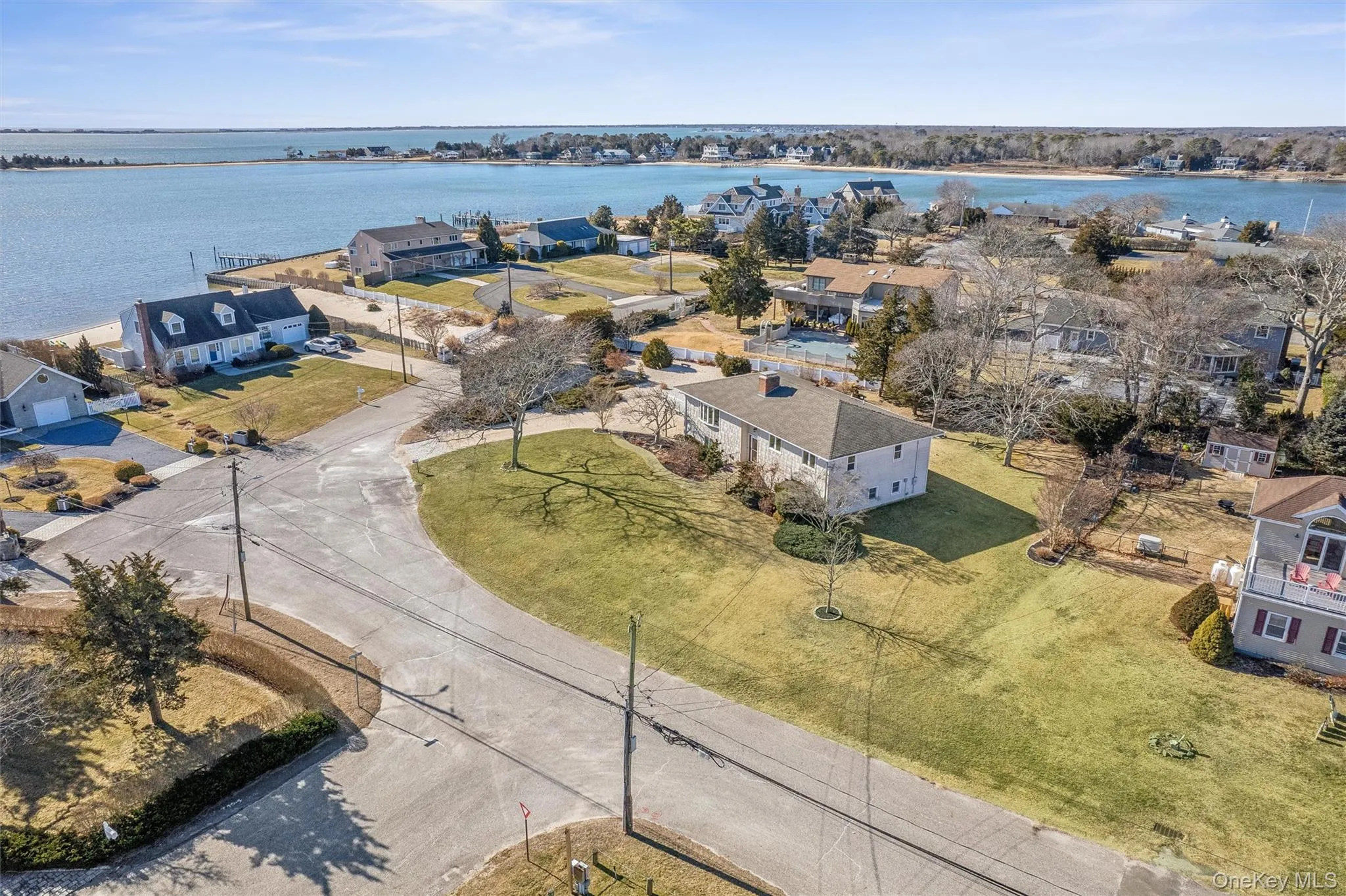 Aerial view featuring a water view Aerial view featuring a water view