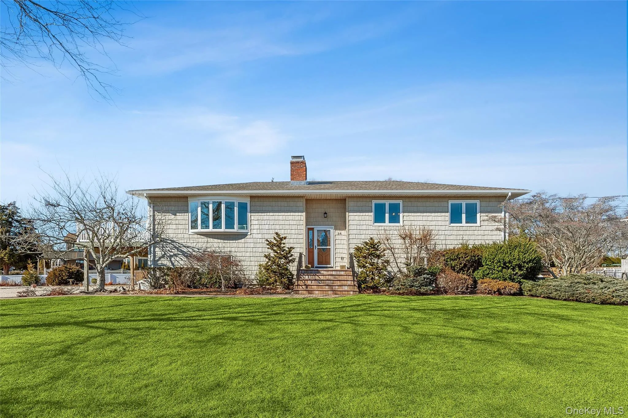 View of front of house with a front lawn View of front of house with a front lawn