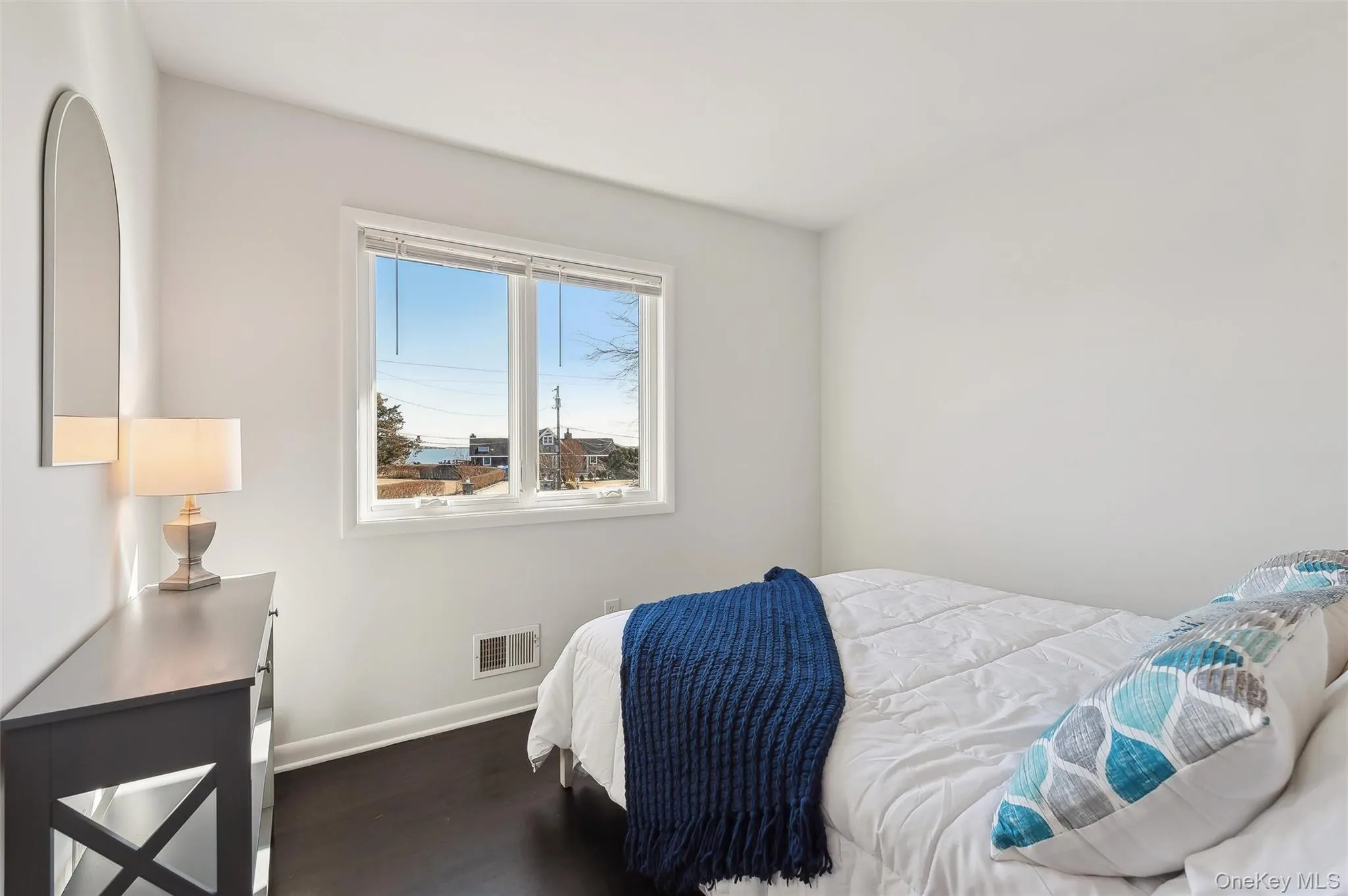 Bedroom featuring dark wood-type flooring Bedroom featuring dark wood-type flooring