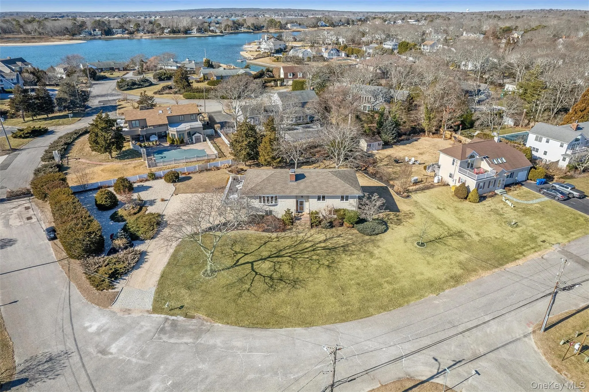 Aerial view featuring a water view Aerial view featuring a water view