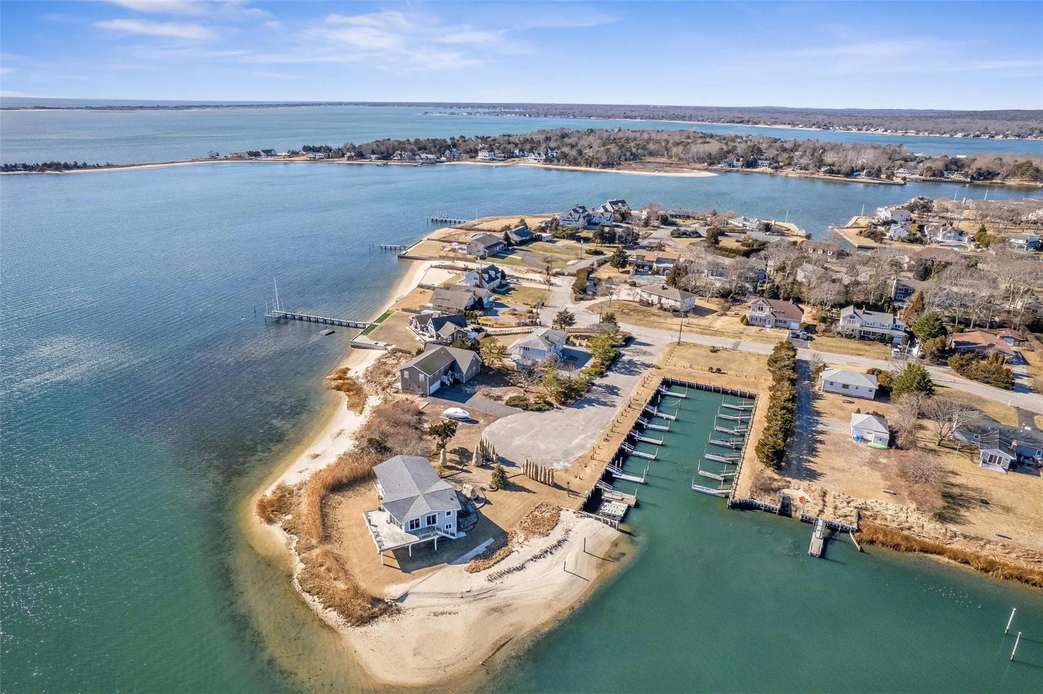 Bird's eye view featuring a view of the beach and a water view Bird's eye view featuring a view of the beach and a water view