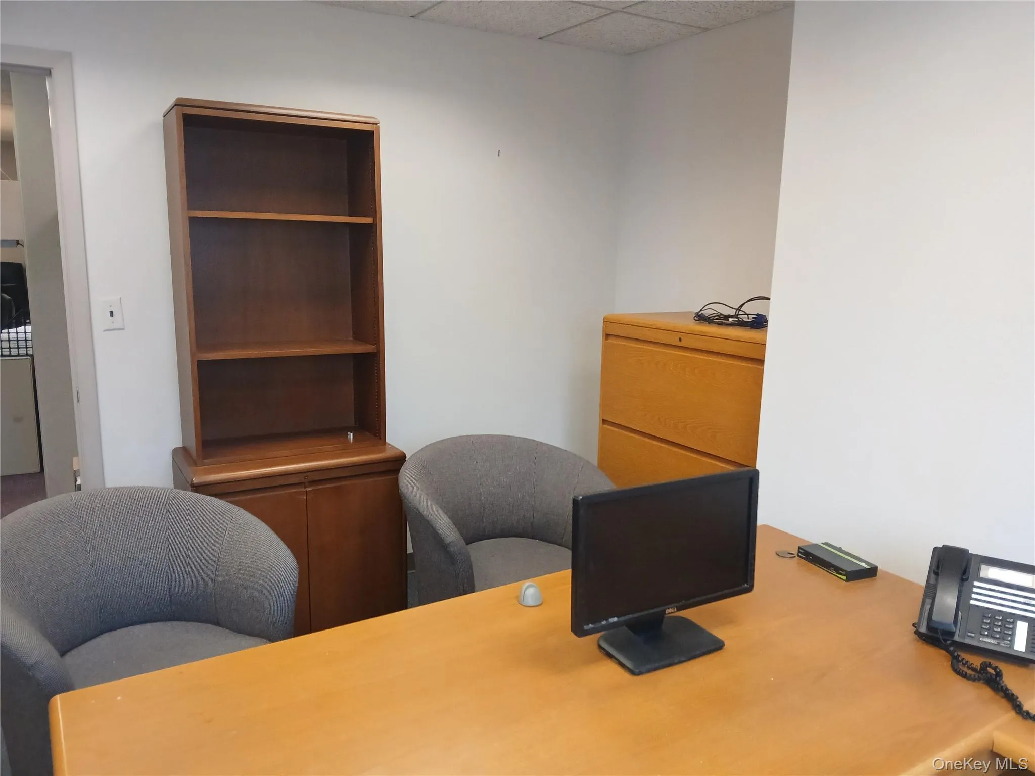 Home office featuring a drop ceiling Home office featuring a drop ceiling