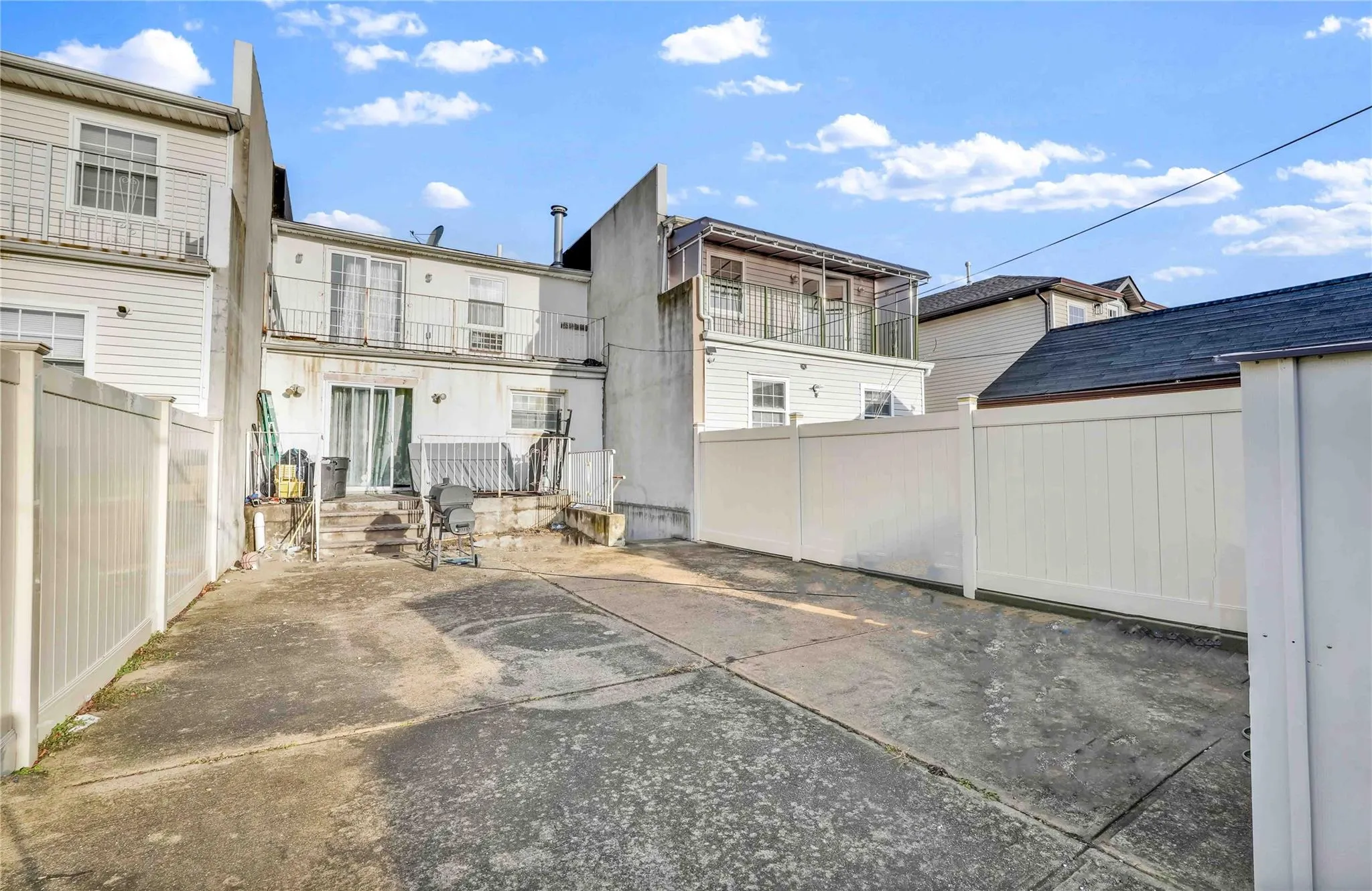 Rear view of house with a patio Rear view of house with a patio