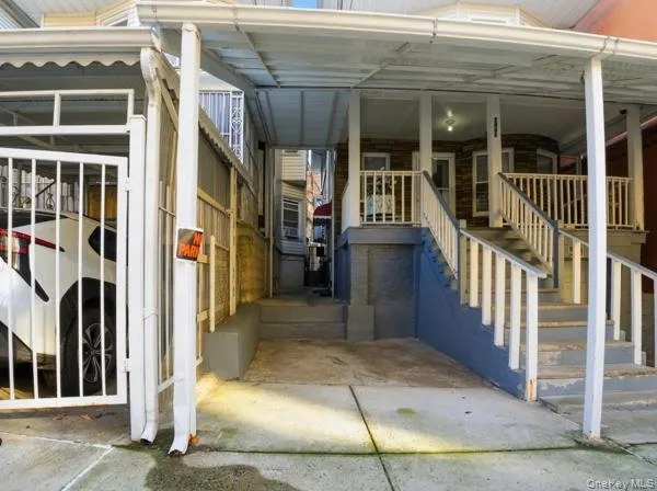 Covered porch featuring stairs Covered porch featuring stairs