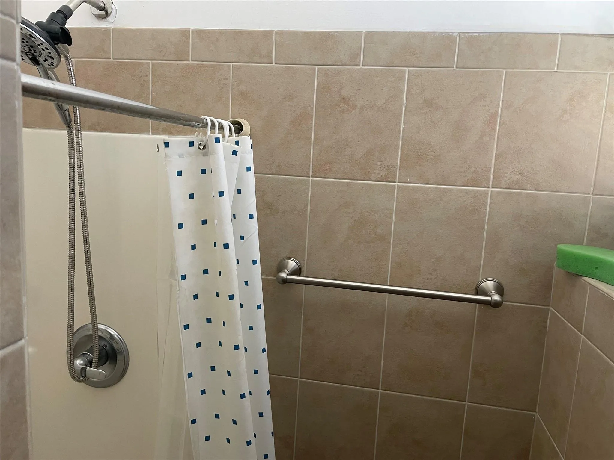 Bathroom featuring curtained shower Bathroom featuring curtained shower