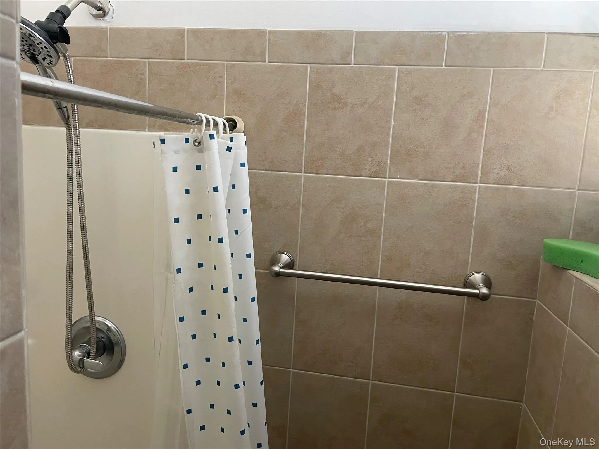 Bathroom featuring curtained shower Bathroom featuring curtained shower