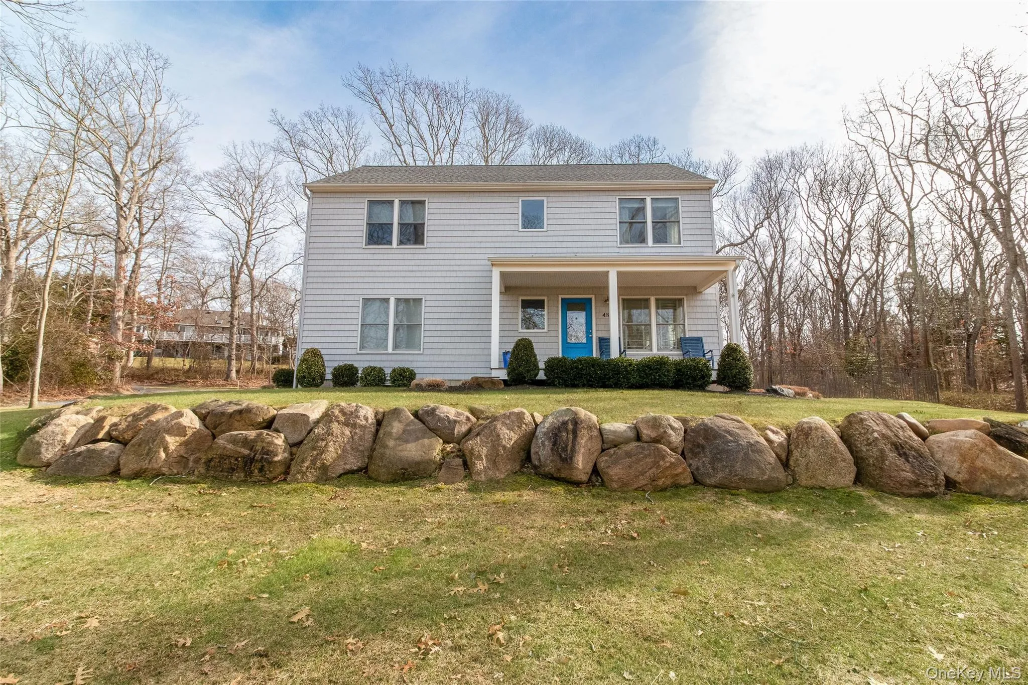 View of front of property with a porch and a front lawn View of front of property with a porch and a front lawn