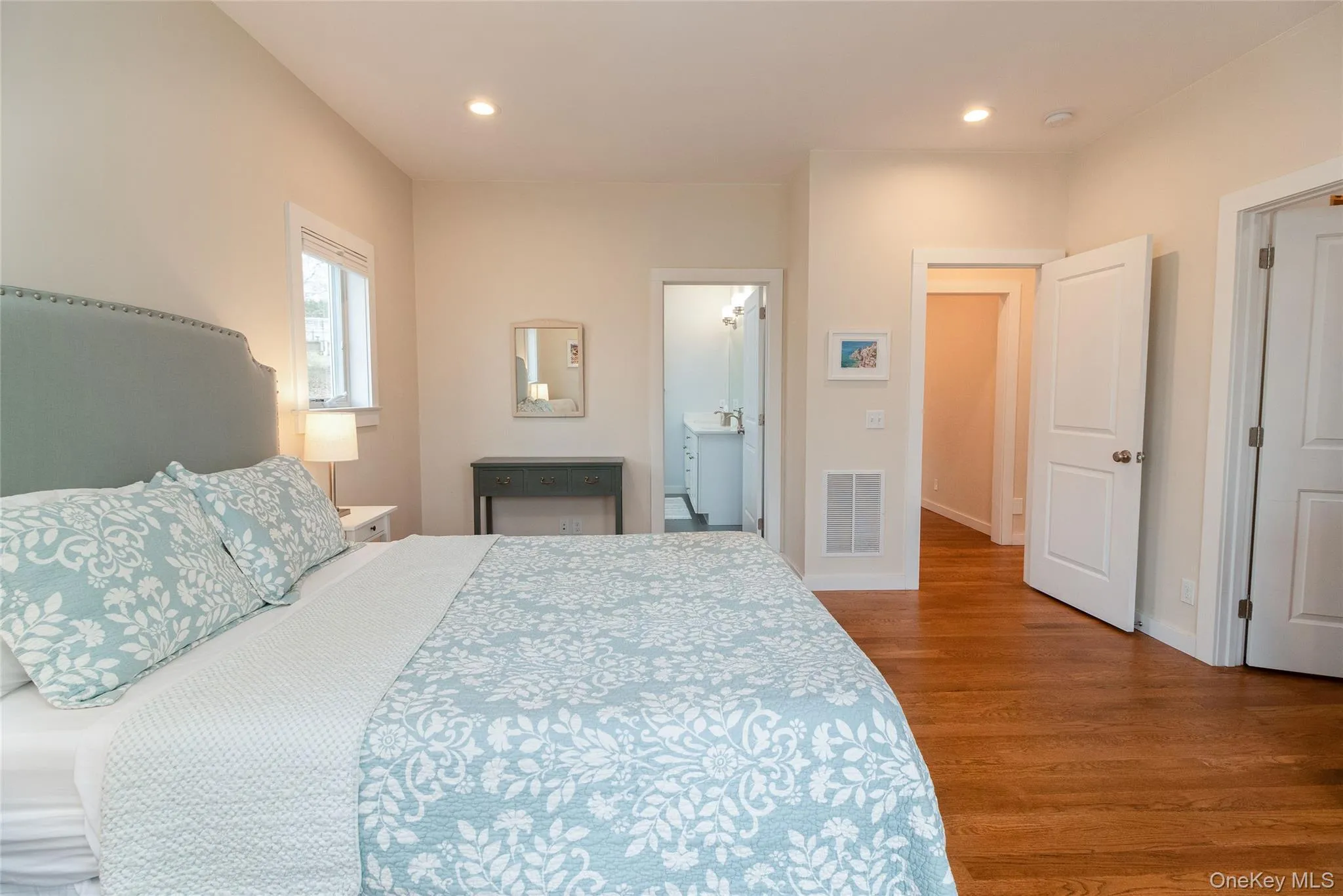 Bedroom featuring hardwood / wood-style flooring Bedroom featuring hardwood / wood-style flooring