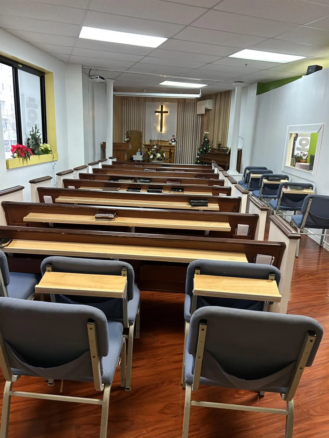 Miscellaneous room with hardwood / wood-style flooring and a paneled ceiling Miscellaneous room with hardwood / wood-style flooring and a paneled ceiling