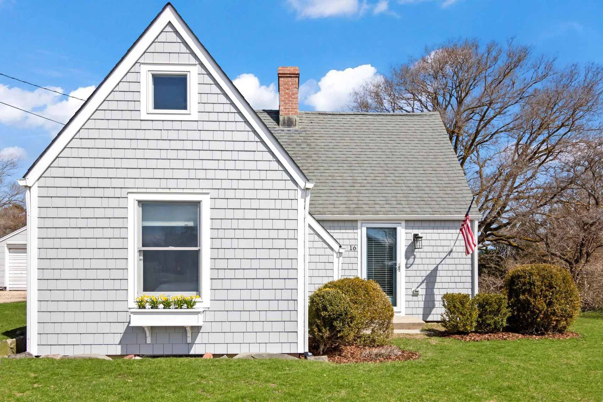 Back of property with a yard Back of property with a yard