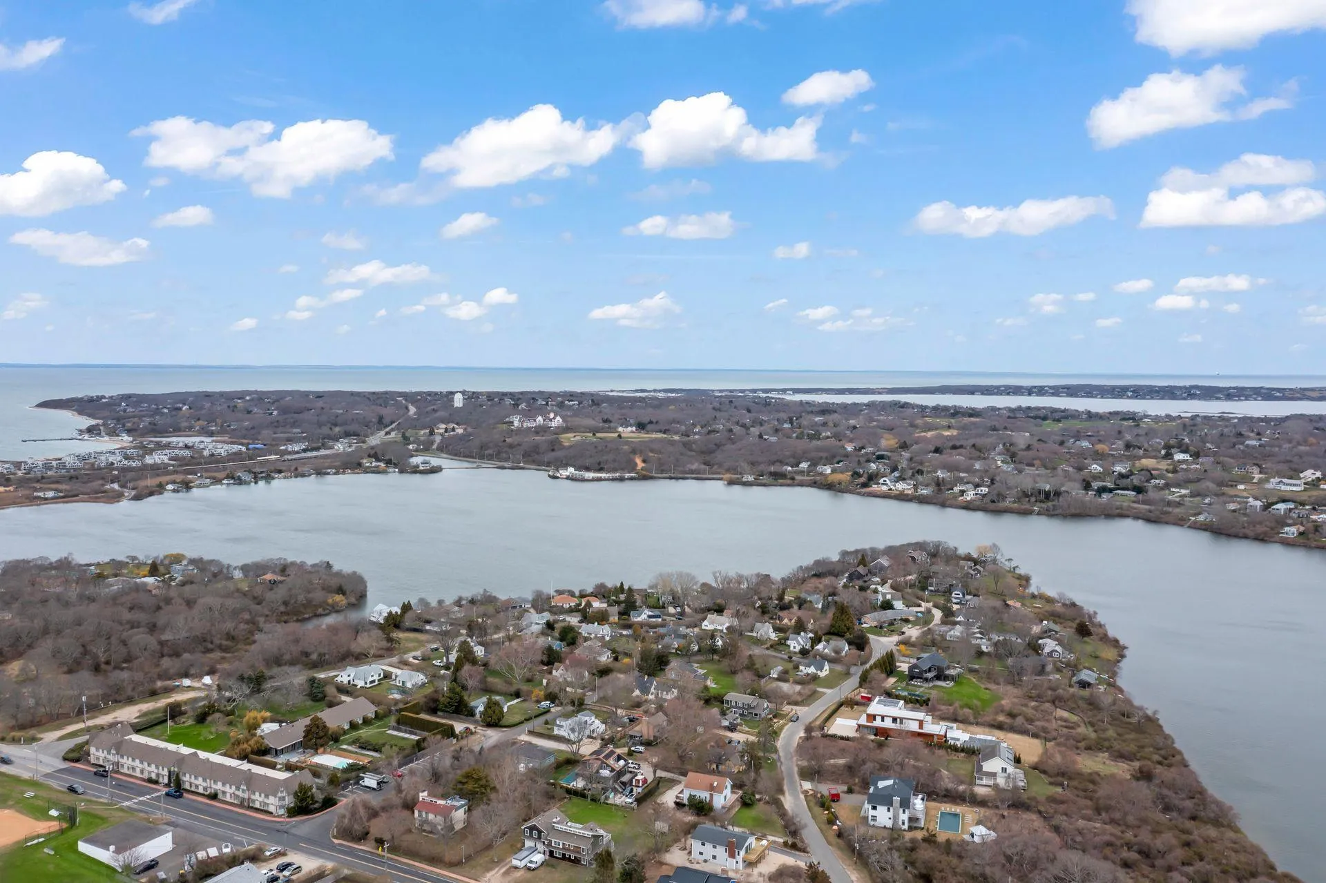 Aerial view featuring a water view Aerial view featuring a water view