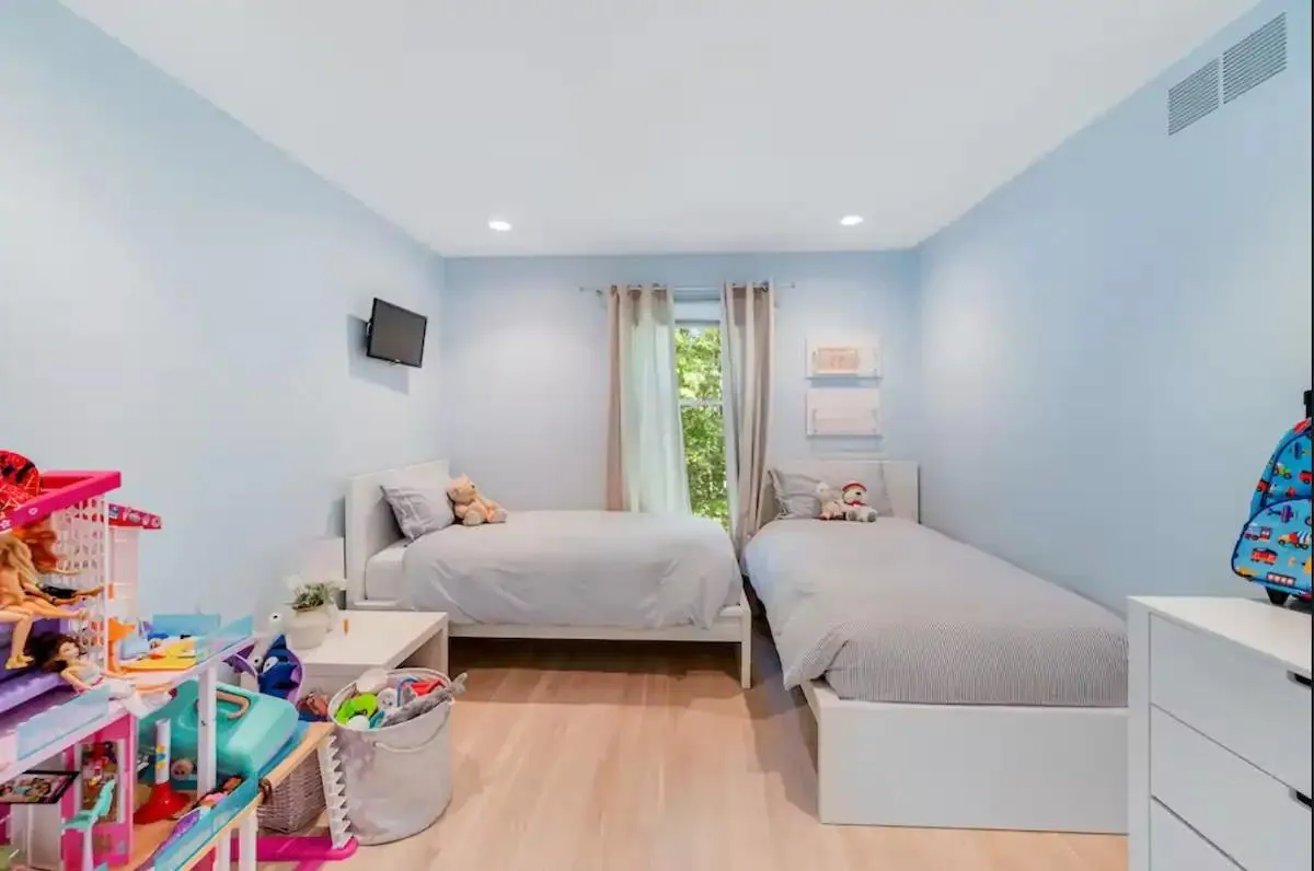 Bedroom with light wood-type flooring Bedroom with light wood-type flooring