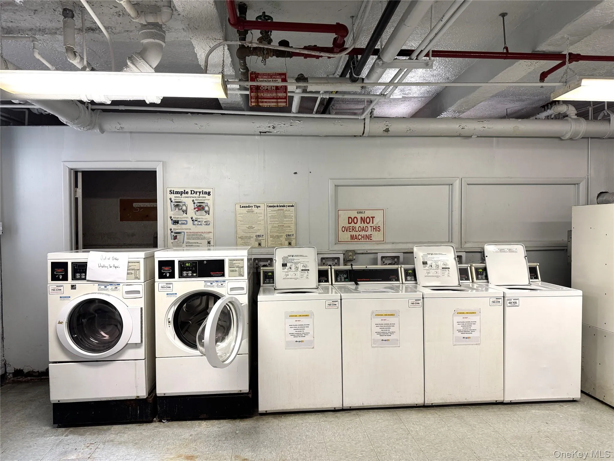 Laundry room featuring separate washer and dryer Laundry room featuring separate washer and dryer
