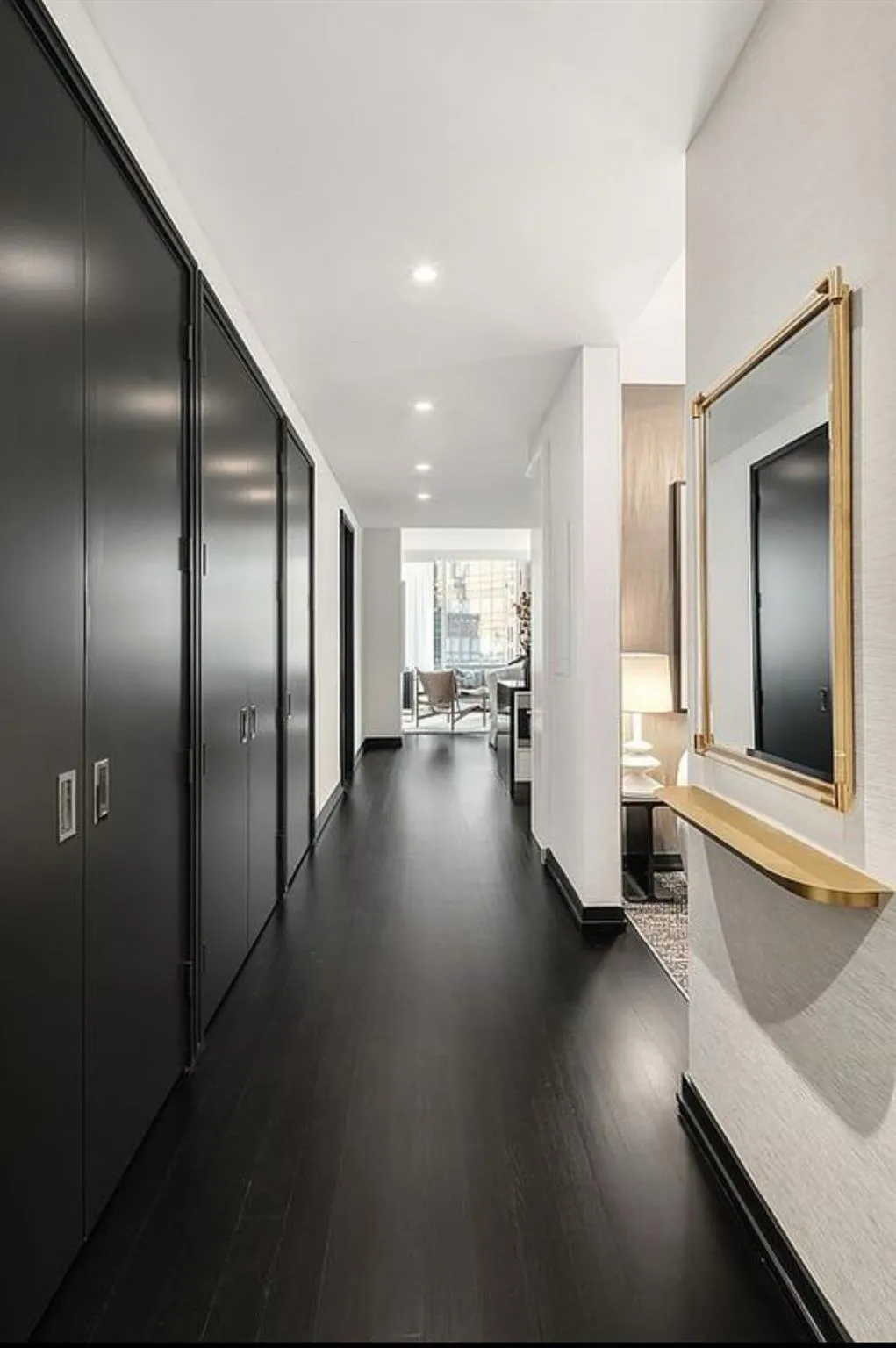 Hall with dark hardwood / wood-style flooring Hall with dark hardwood / wood-style flooring