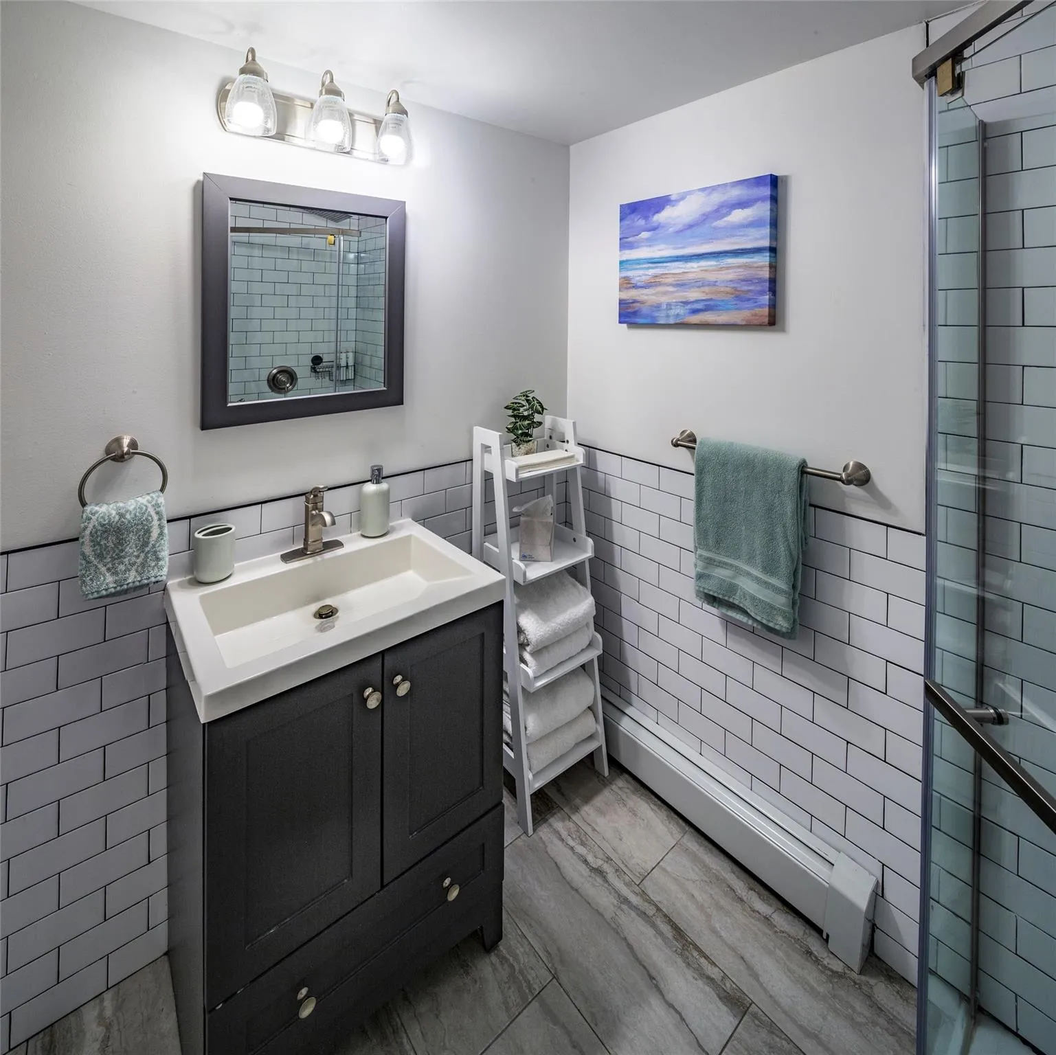 Bathroom with tile walls and vanity Bathroom with tile walls and vanity