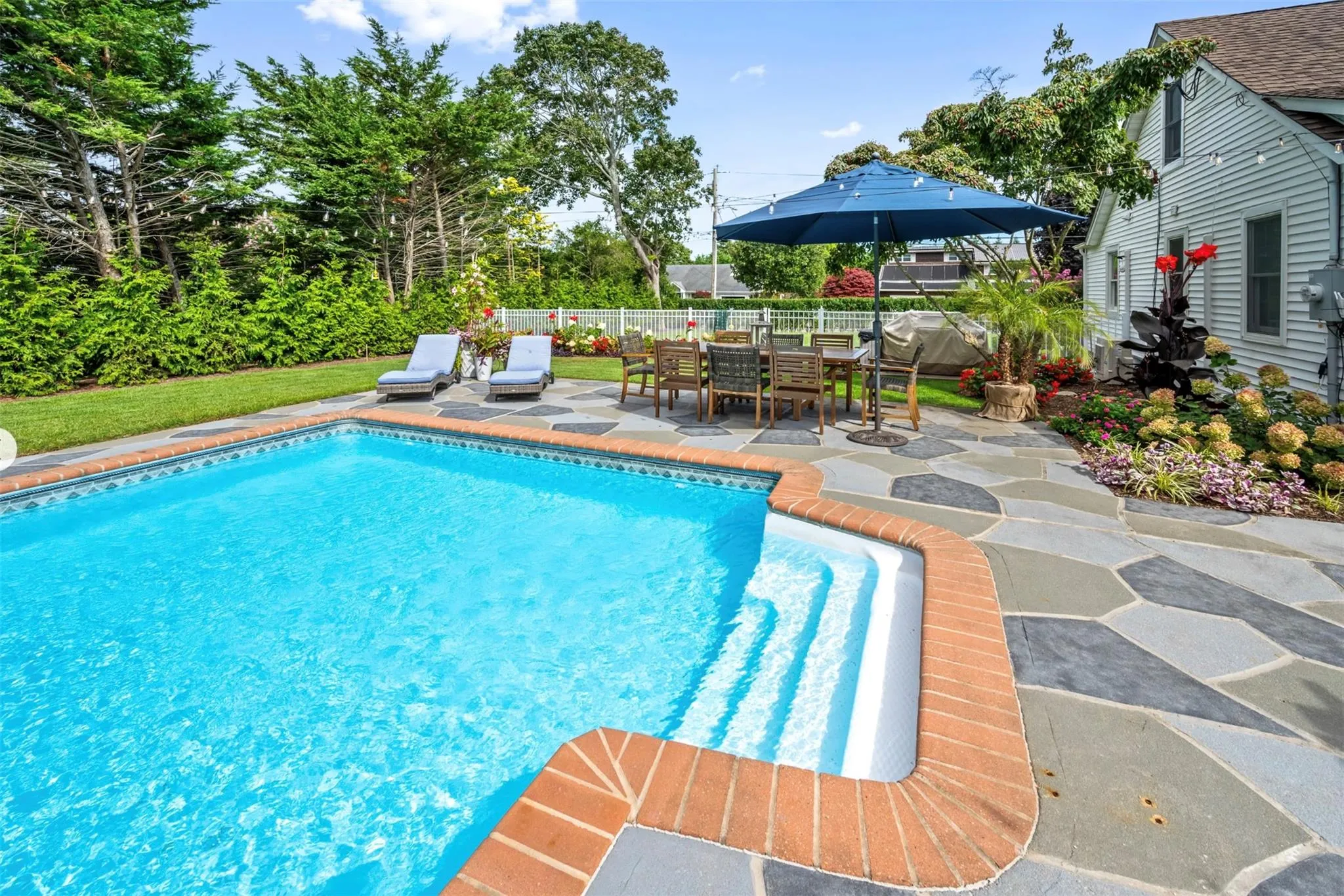 View of pool with a patio area View of pool with a patio area