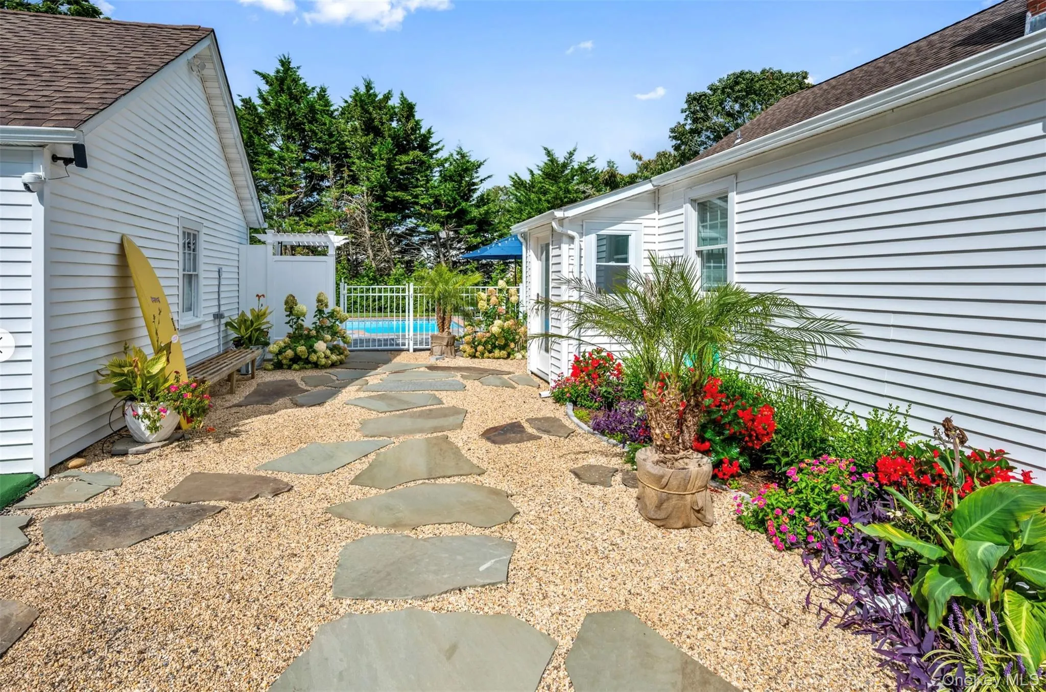 View of yard featuring a fenced in pool and a patio View of yard featuring a fenced in pool and a patio