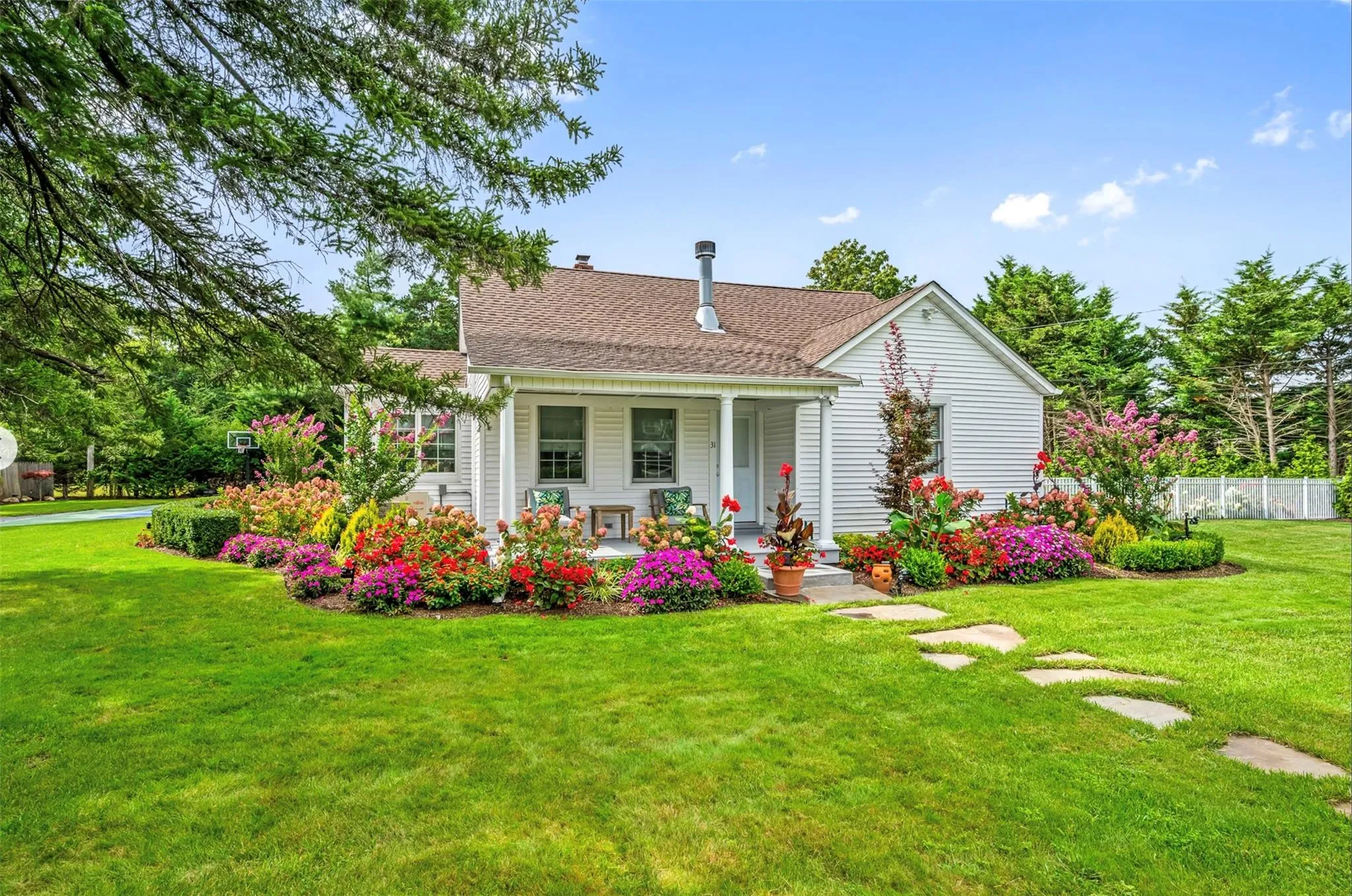 View of front of house featuring a front yard and covered porch View of front of house featuring a front yard and covered porch