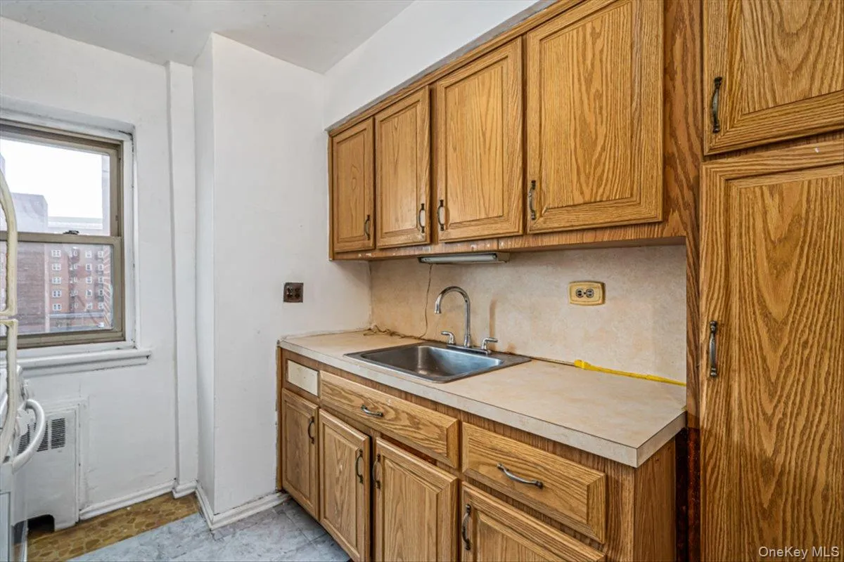 Kitchen featuring sink and backsplash Kitchen featuring sink and backsplash