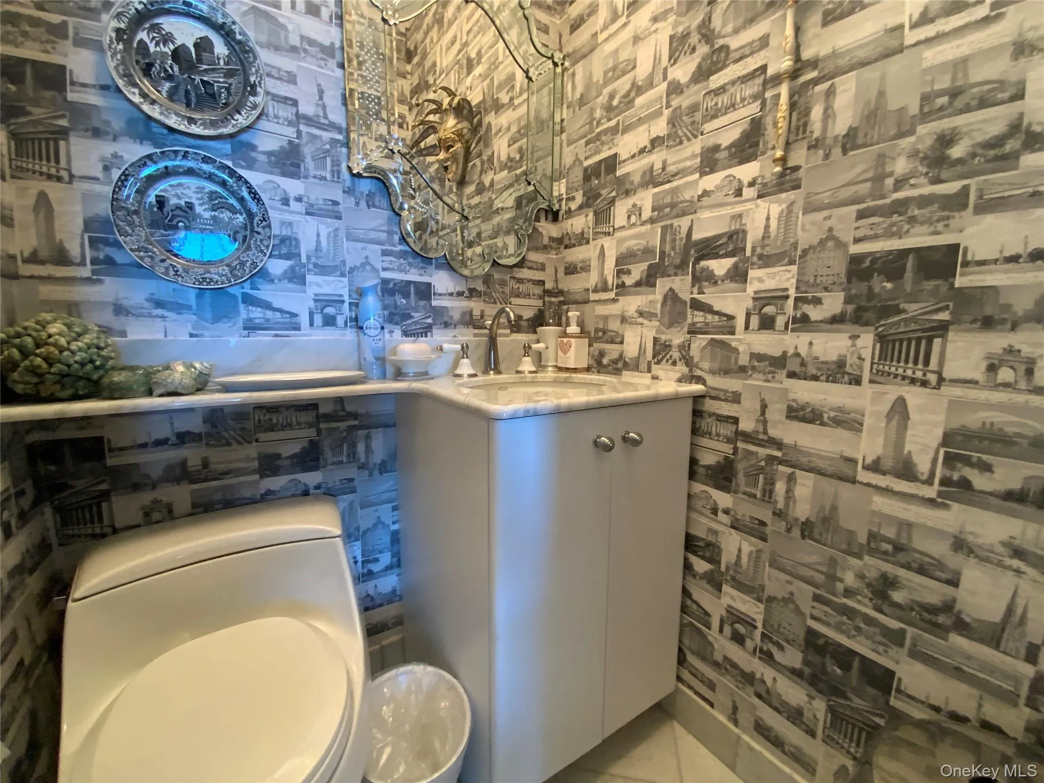 Bathroom featuring vanity and light tile patterned floors Bathroom featuring vanity and light tile patterned floors