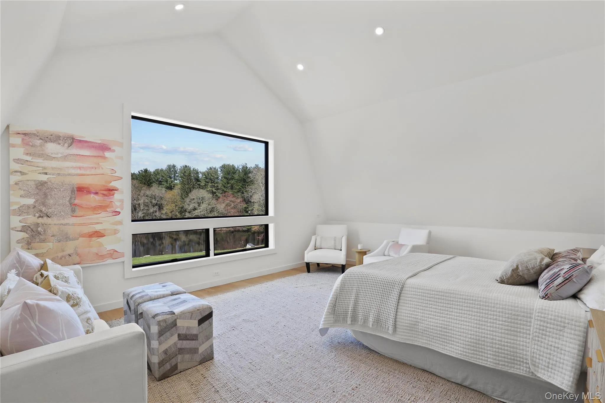 Guest studio suite with full bath above one of the two detached garages Guest studio suite with full bath above one of the two detached garages