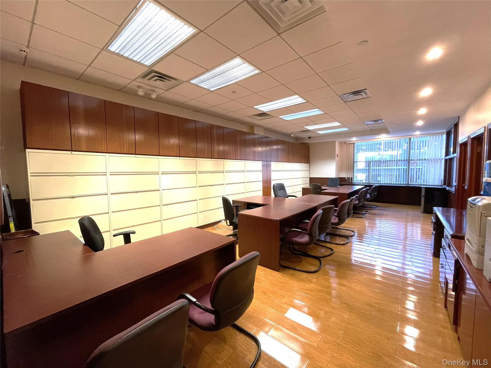 Office area with a drop ceiling Office area with a drop ceiling