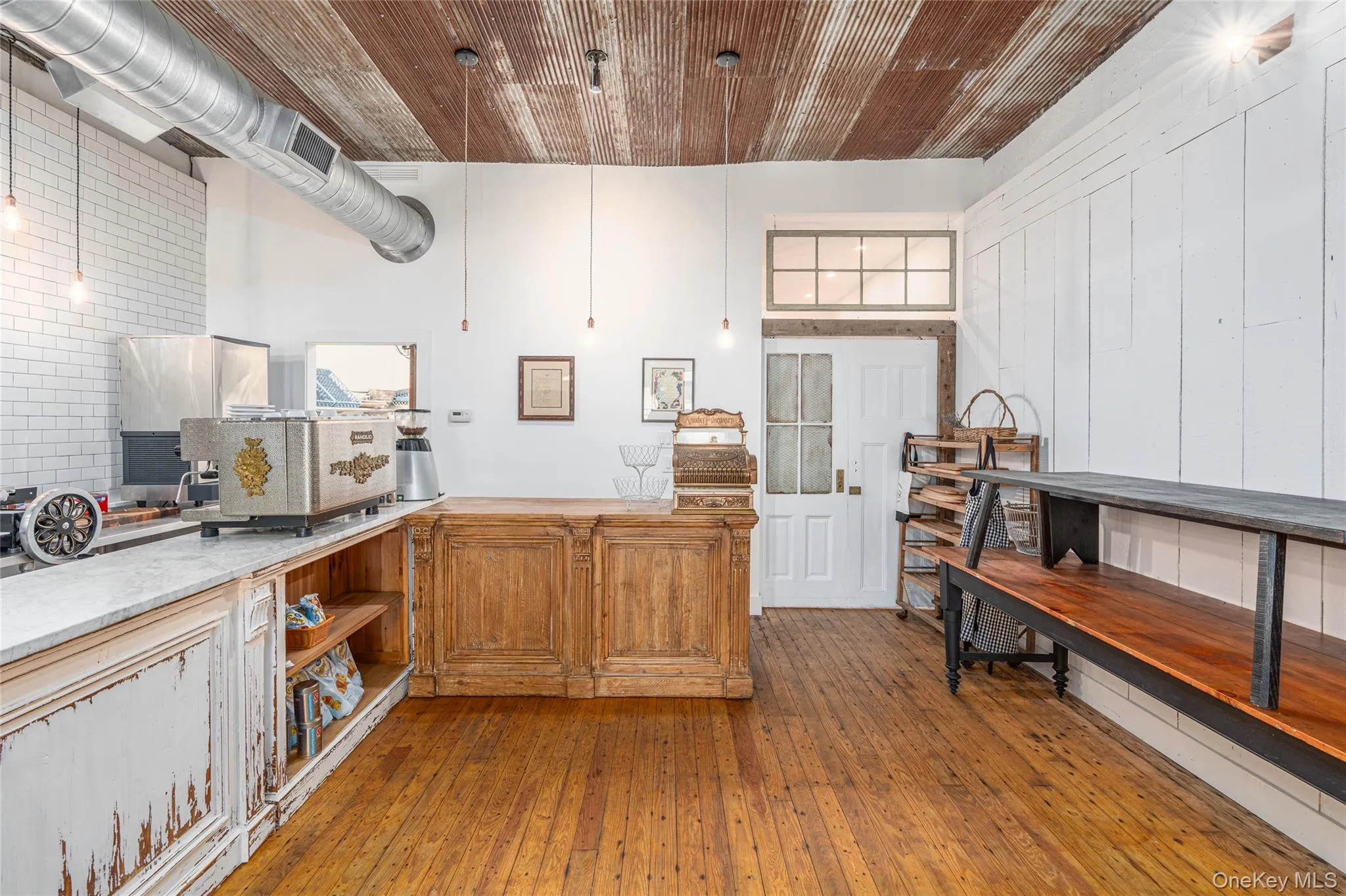 Kitchen with wood-type flooring and wooden ceiling Kitchen with wood-type flooring and wooden ceiling