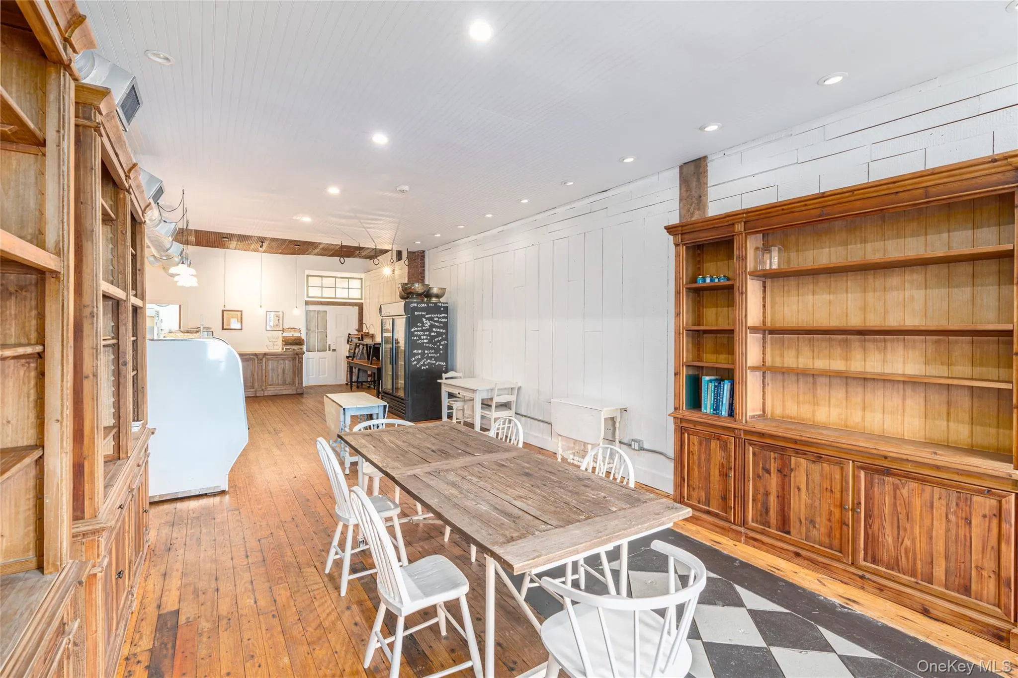 Dining room with light hardwood / wood-style floors Dining room with light hardwood / wood-style floors