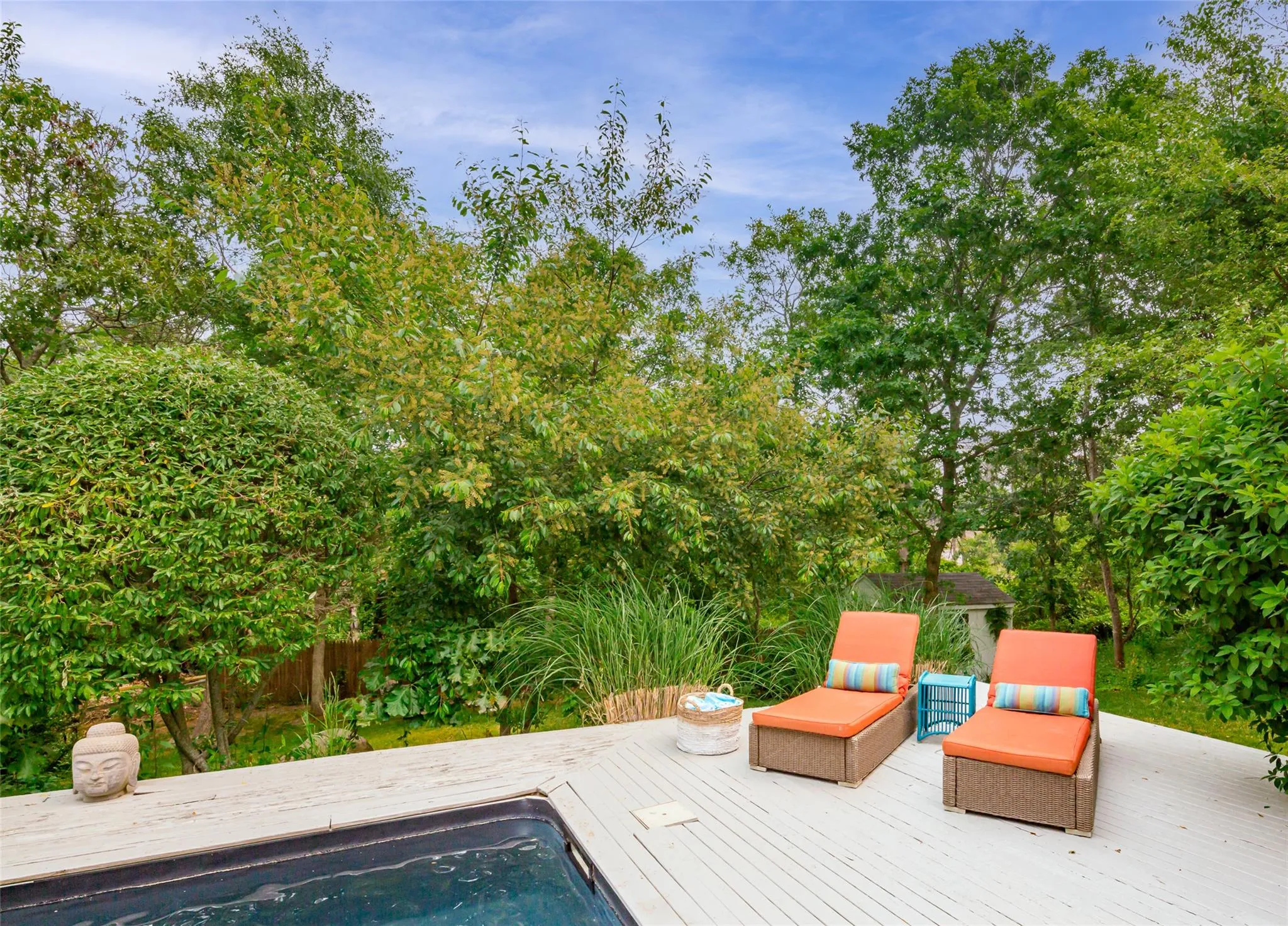 View of swimming pool with fence and a deck View of swimming pool with fence and a deck