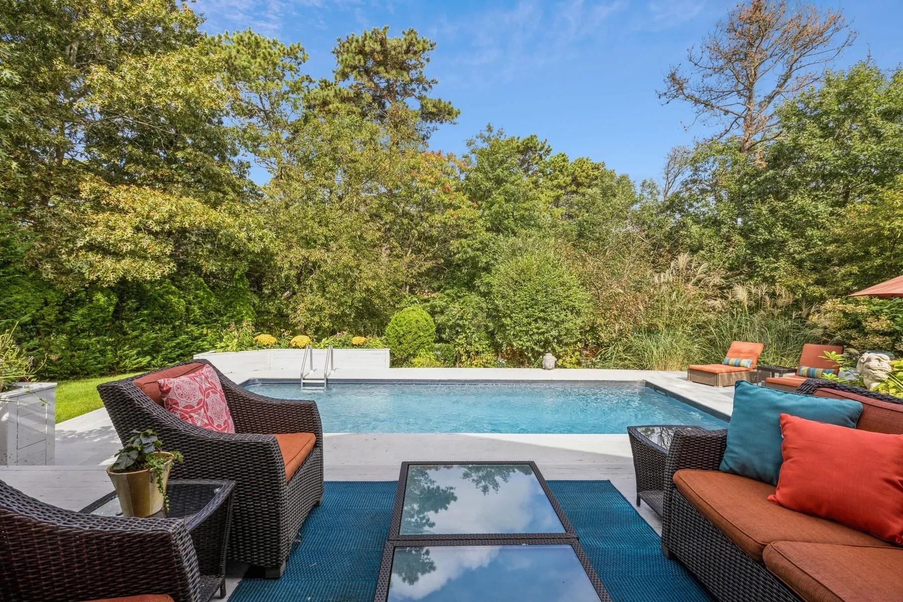 View of swimming pool featuring an outdoor hangout area and a patio area View of swimming pool featuring an outdoor hangout area and a patio area