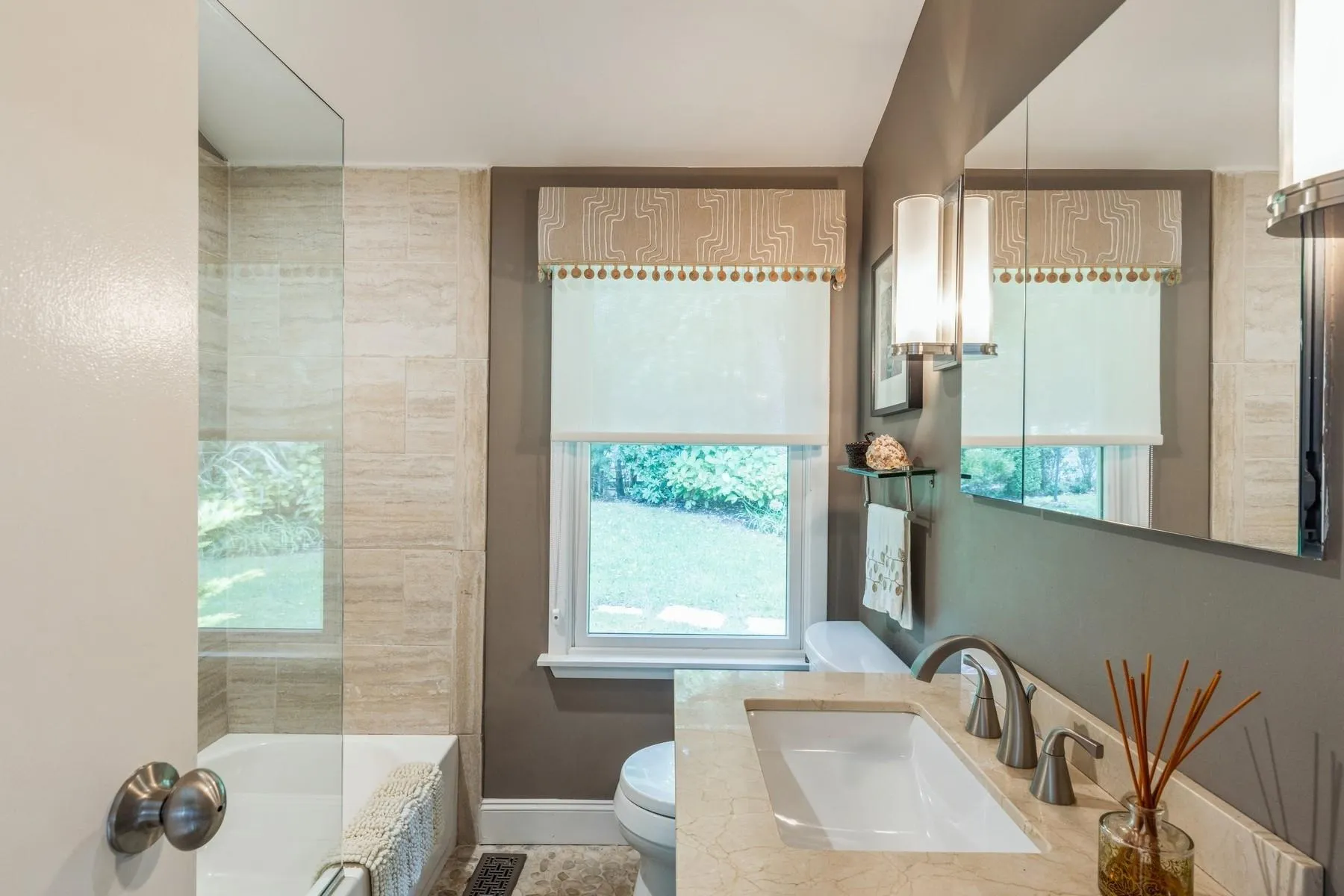 Bathroom with vanity, toilet, and a bathing tub/shower Bathroom with vanity, toilet, and a bathing tub/shower