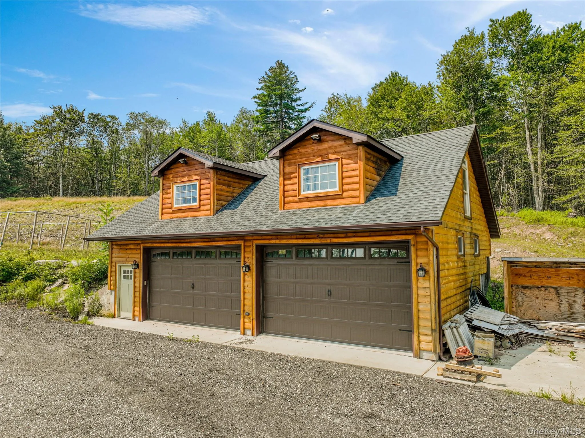 4 car equipment Garage featuring a detached garage 4 car equipment Garage featuring a detached garage
