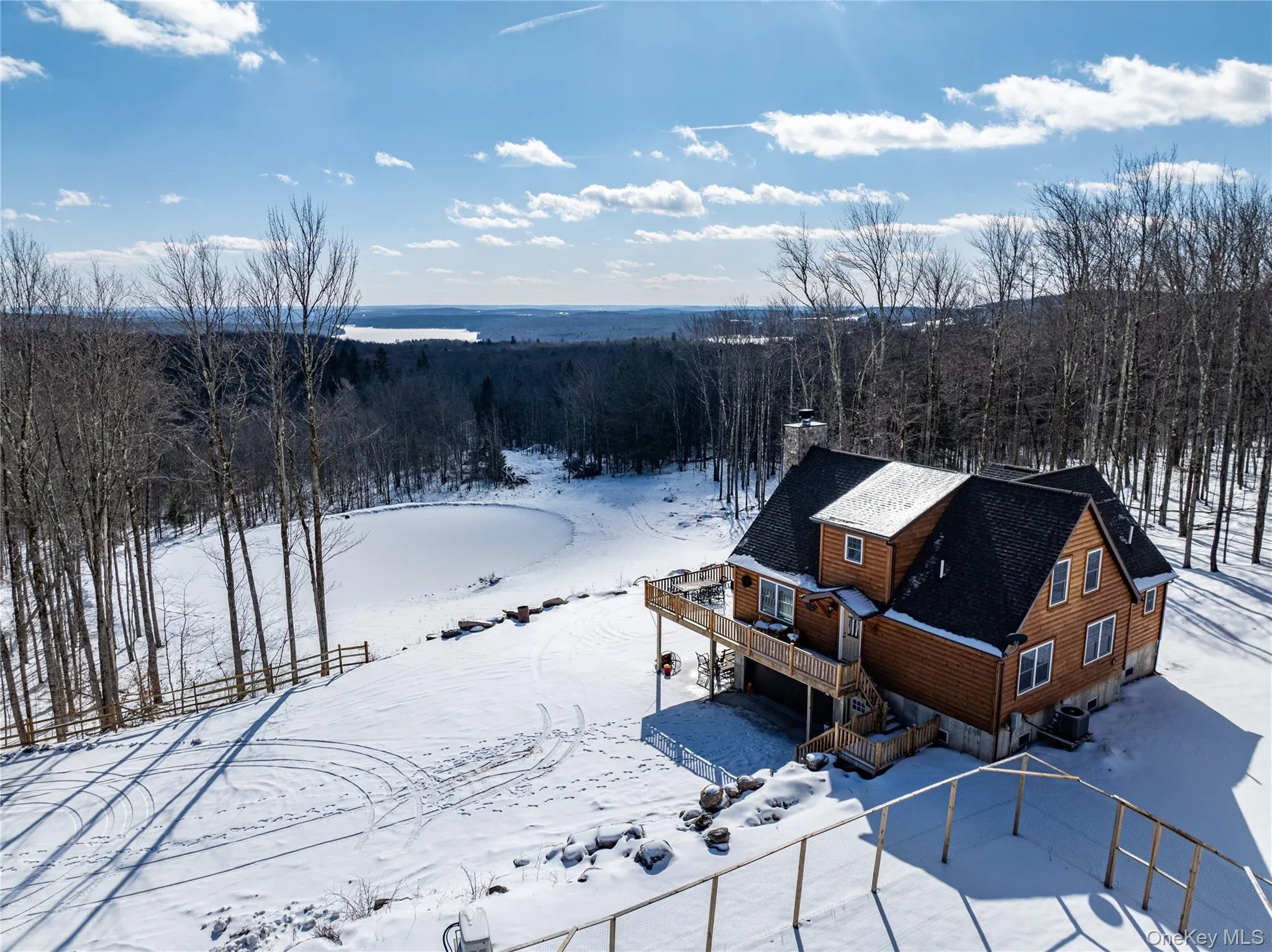 Snowy aerial view with a forest view Snowy aerial view with a forest view