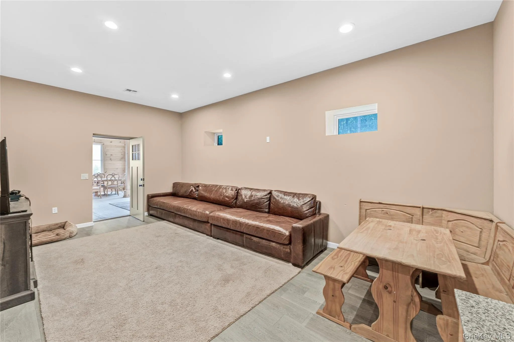 Game room with recessed lighting and light wood-style floors Game room with recessed lighting and light wood-style floors