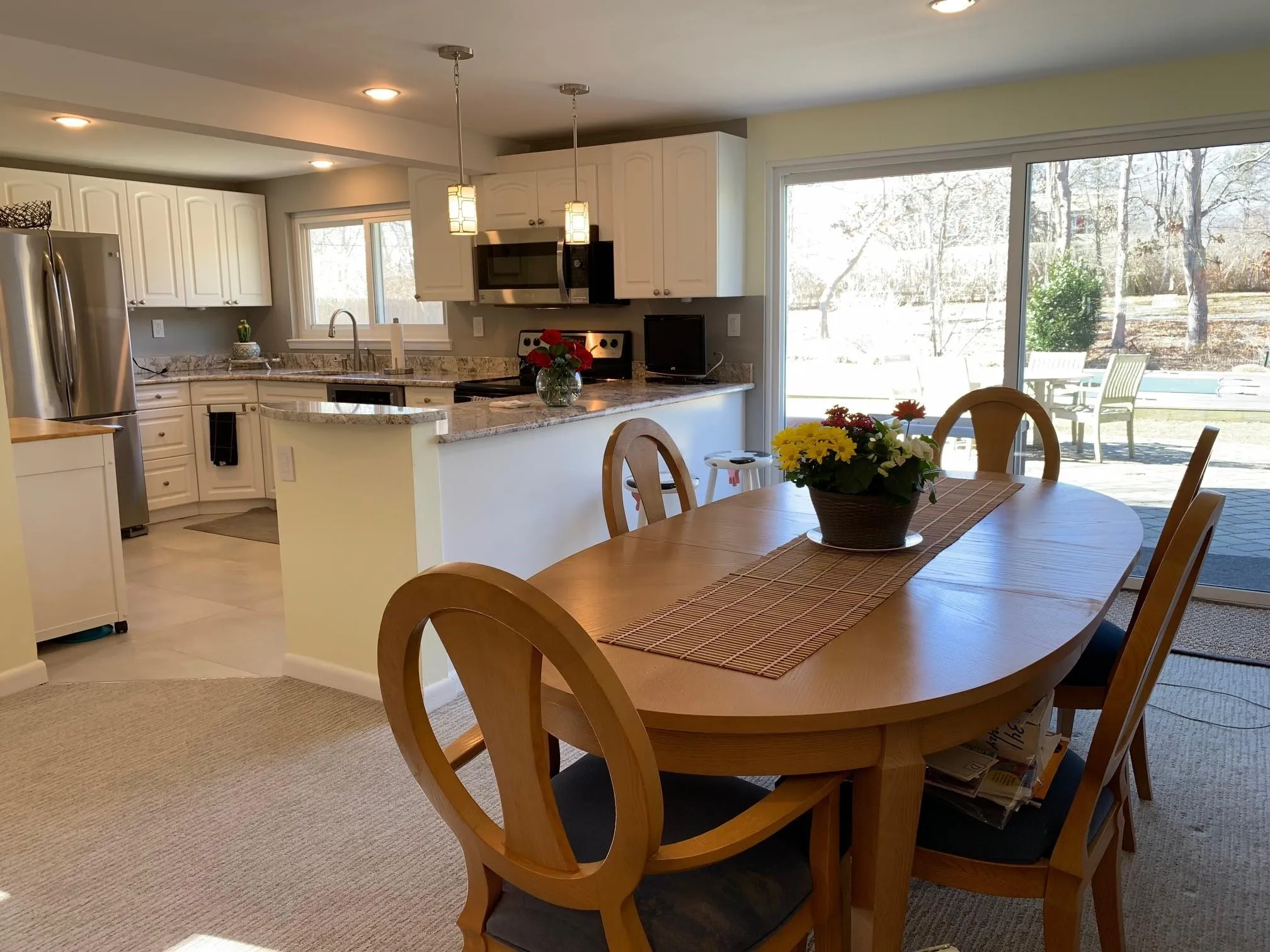 Carpeted dining room with sink Carpeted dining room with sink