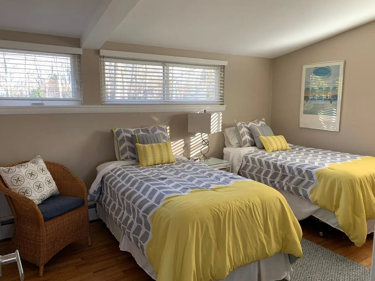 Bedroom with lofted ceiling with beams, a baseboard radiator, and dark hardwood / wood-style flooring Bedroom with lofted ceiling with beams, a baseboard radiator, and dark hardwood / wood-style flooring
