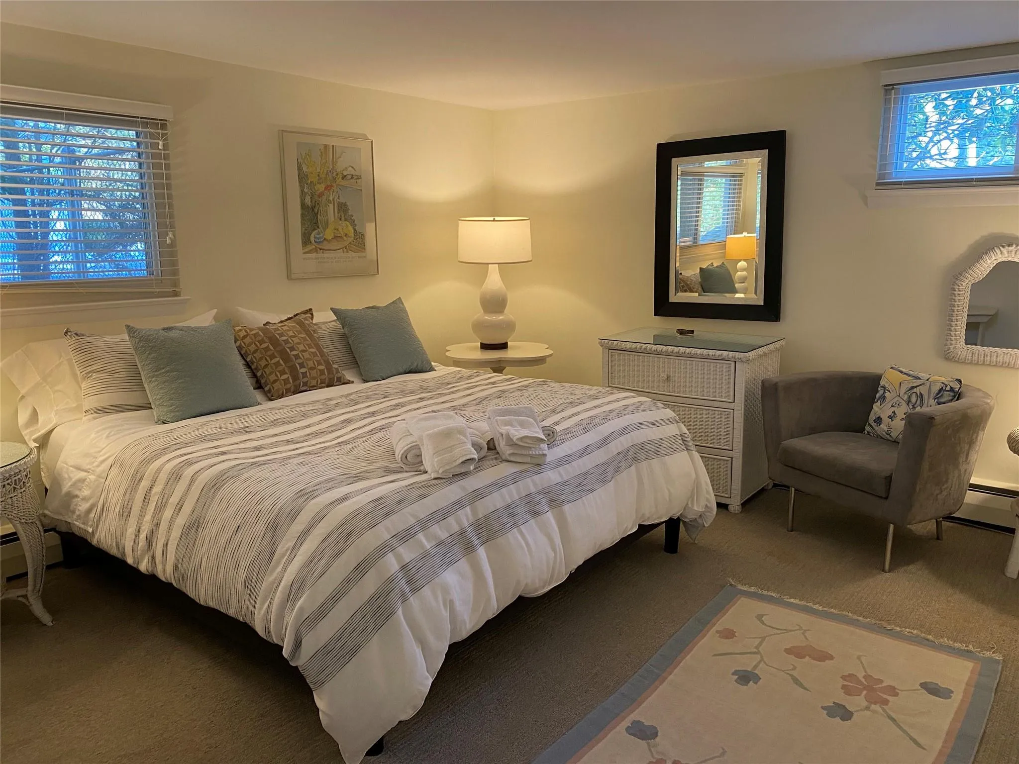 Carpeted bedroom with a baseboard heating unit Carpeted bedroom with a baseboard heating unit