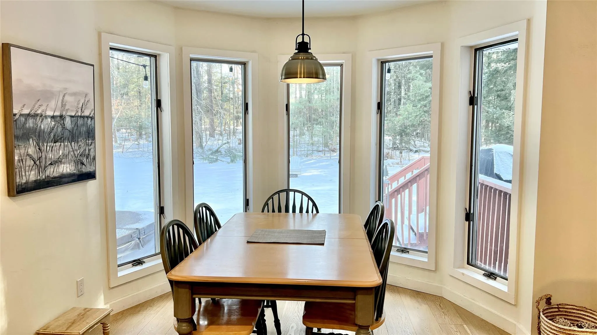Dining room with light hardwood / wood-style floors Dining room with light hardwood / wood-style floors