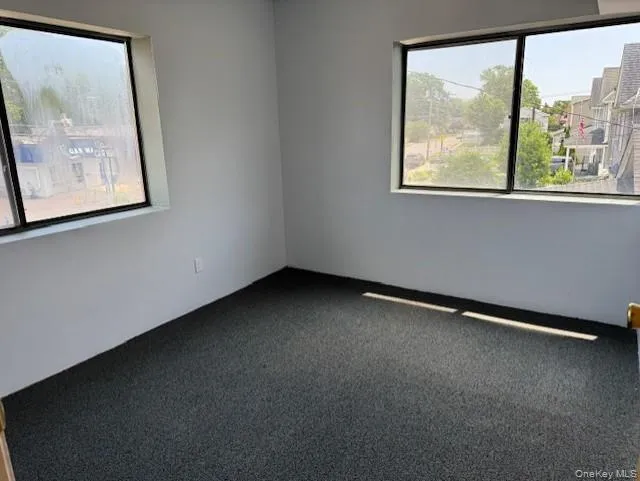 View of carpeted empty room View of carpeted empty room