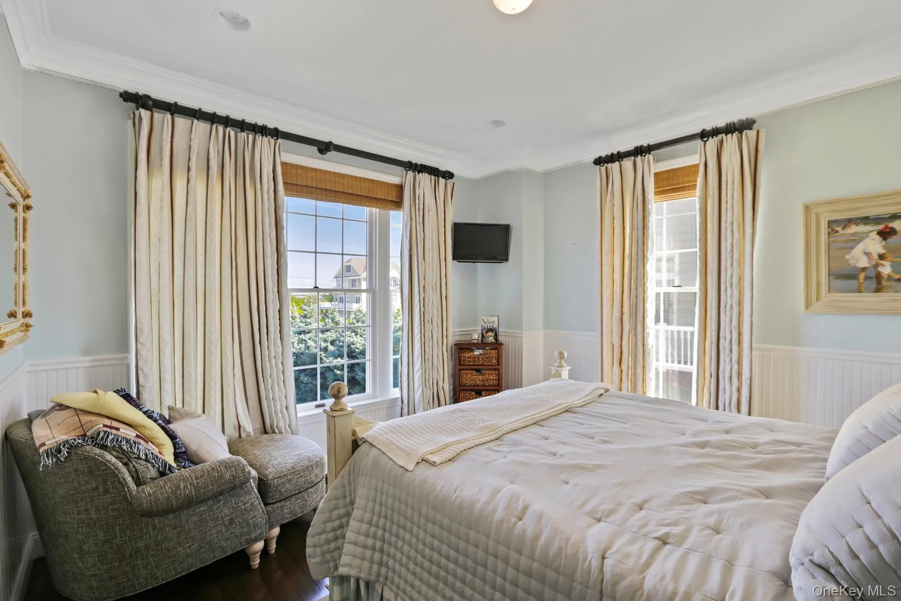 Bedroom featuring ornamental molding Bedroom featuring ornamental molding