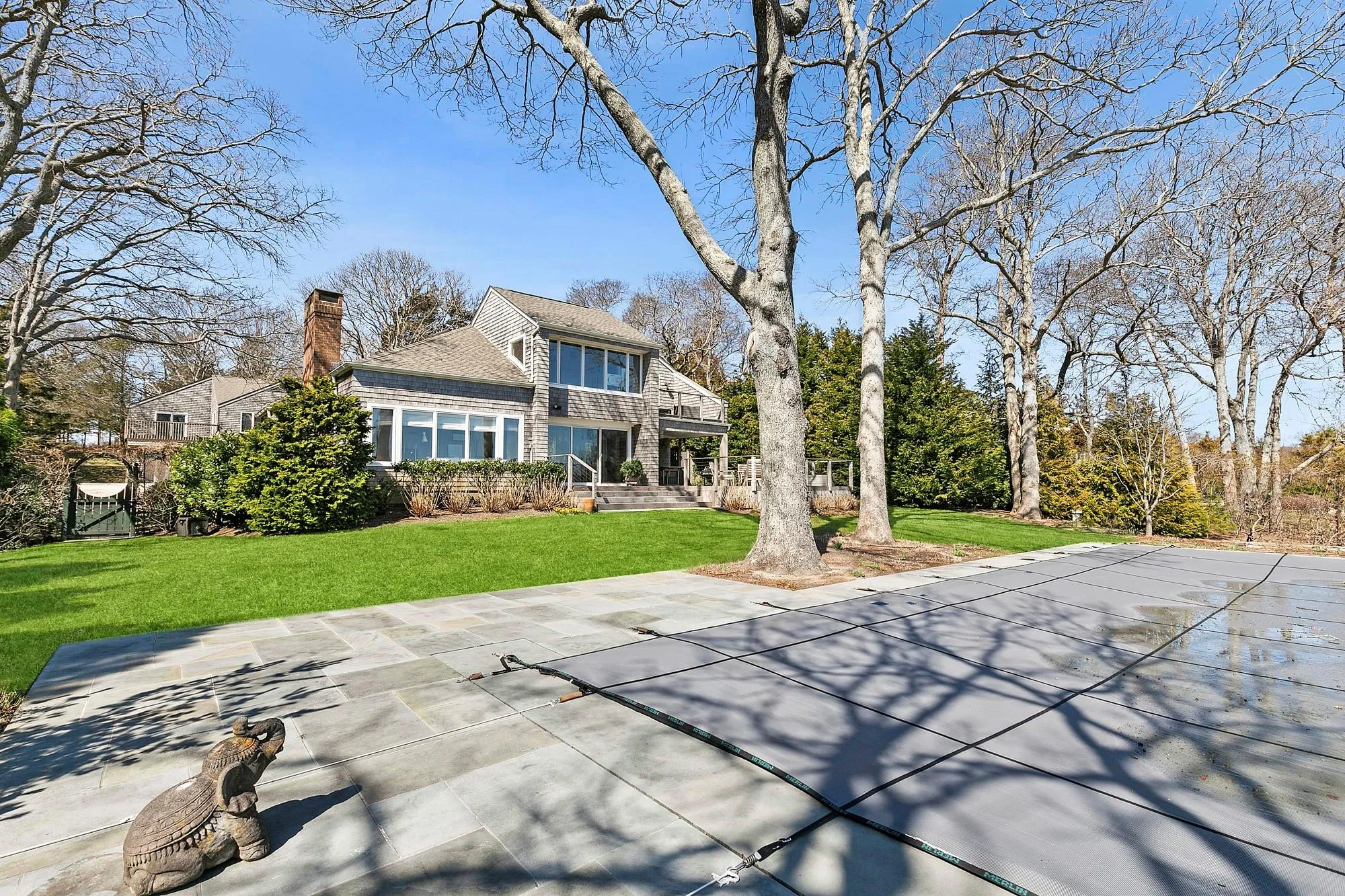 Back of property with a yard Back of property with a yard