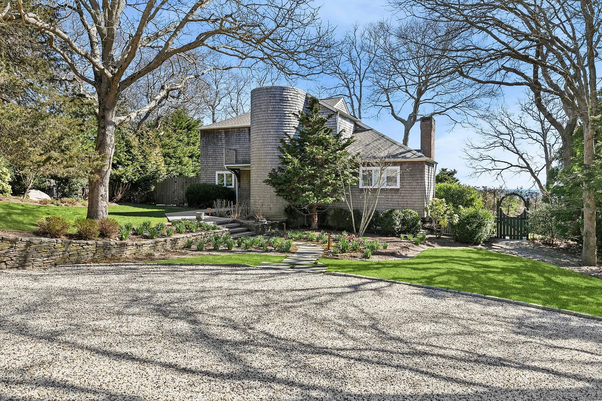 View of property exterior with a yard View of property exterior with a yard