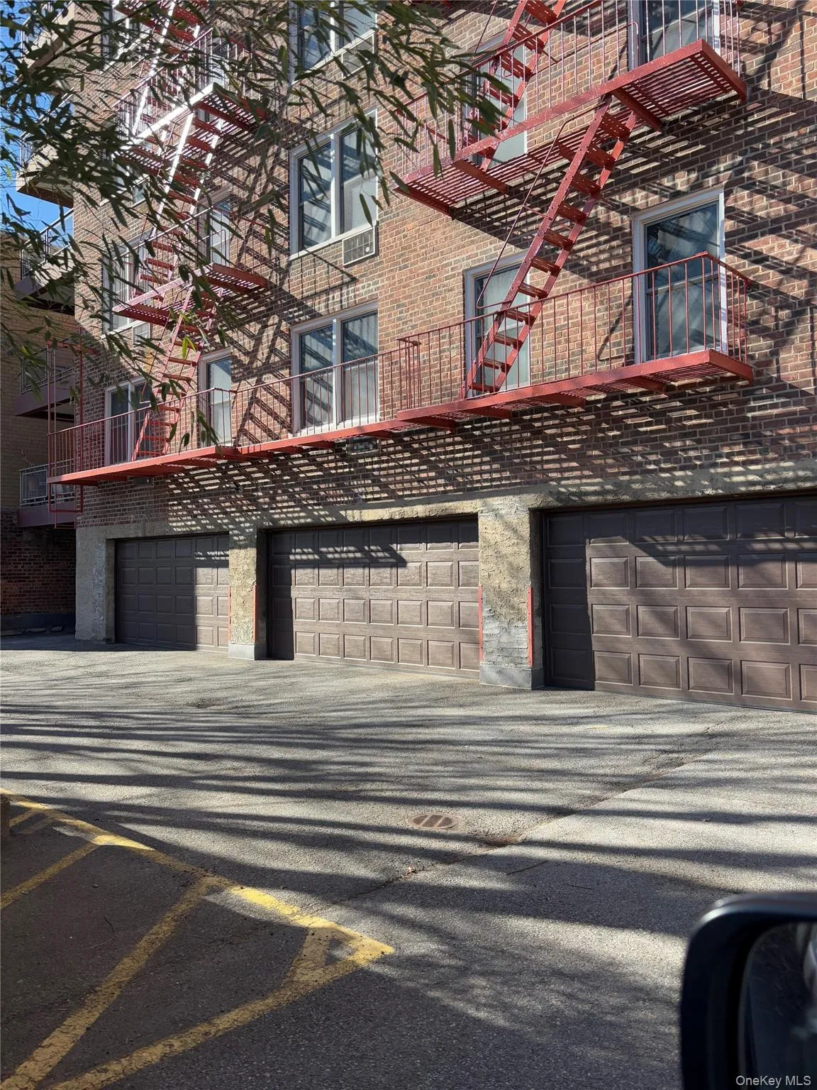 View of property featuring an attached garage View of property featuring an attached garage