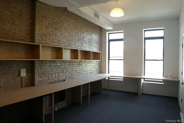 Another view of office space with natural light Another view of office space with natural light